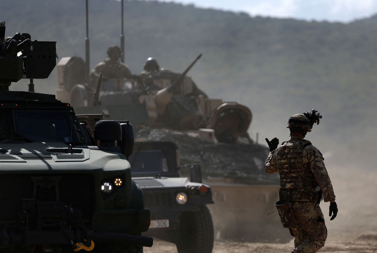 Armoured vehicles move during "Noble Blueprint 2023" military exercise at Novo Selo military grounds, Bulgaria, September 26, 2023. The drill is organised by the NATO multinational brigade under Italy's command, including army personnel and equipment from Bulgaria, Greece, Montenegro, North Macedonia, Turkey, Albania and the U.S. 