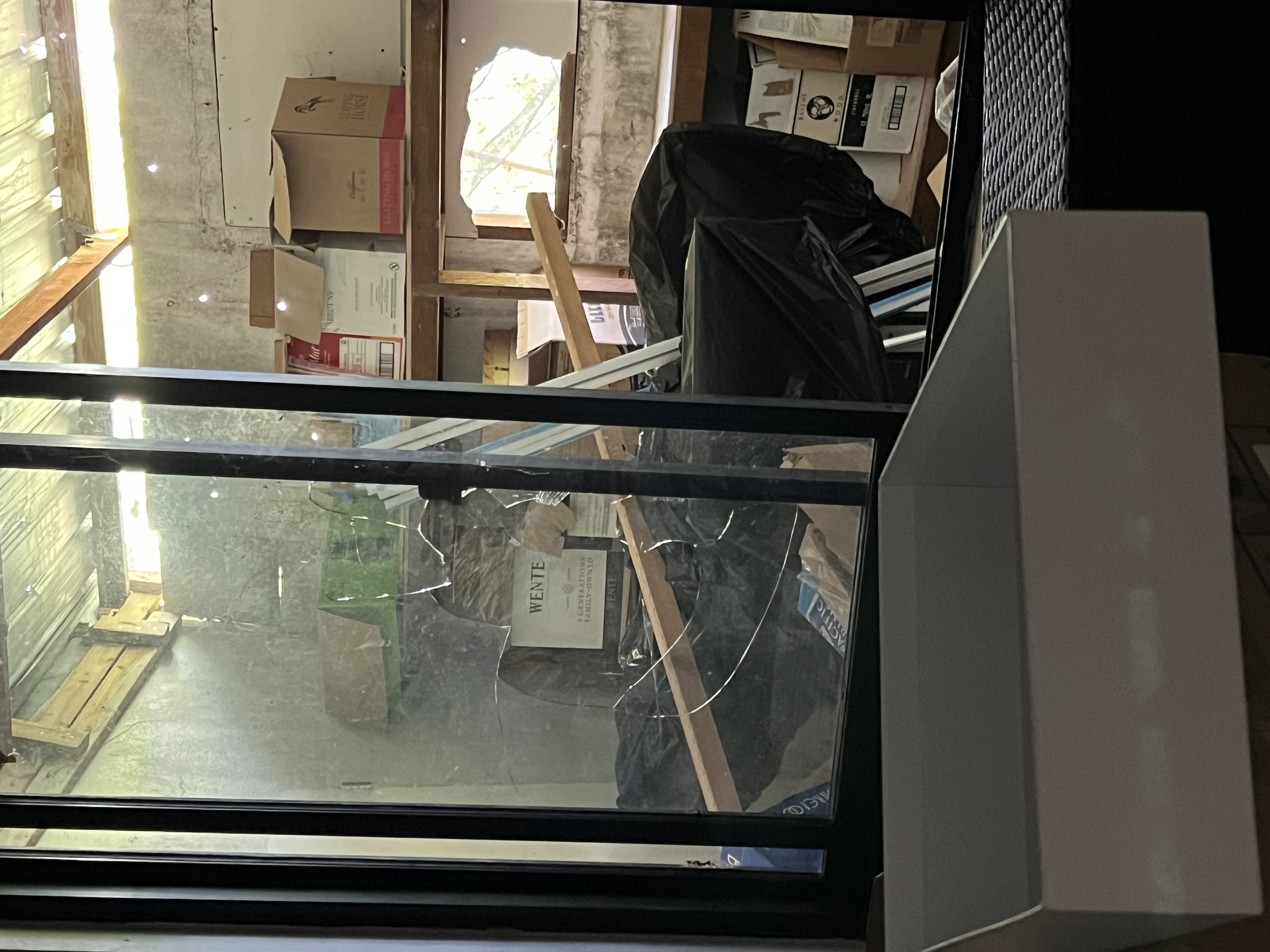 The burglars broke the window  after a deadbolted door prevented their entry.