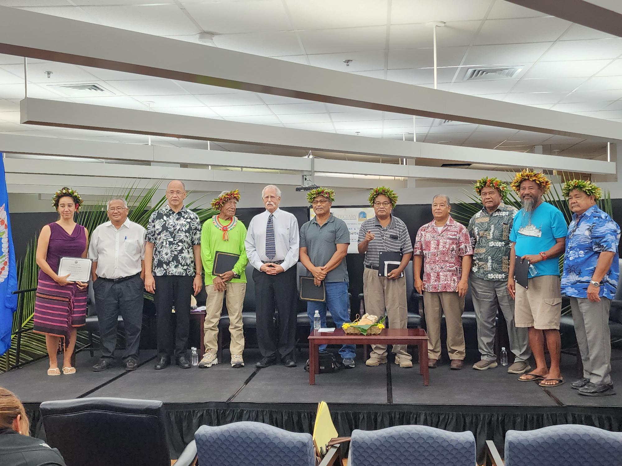 CNMI judiciary officials pose for a photo with Refaluwasch cultural experts in the Marianas.