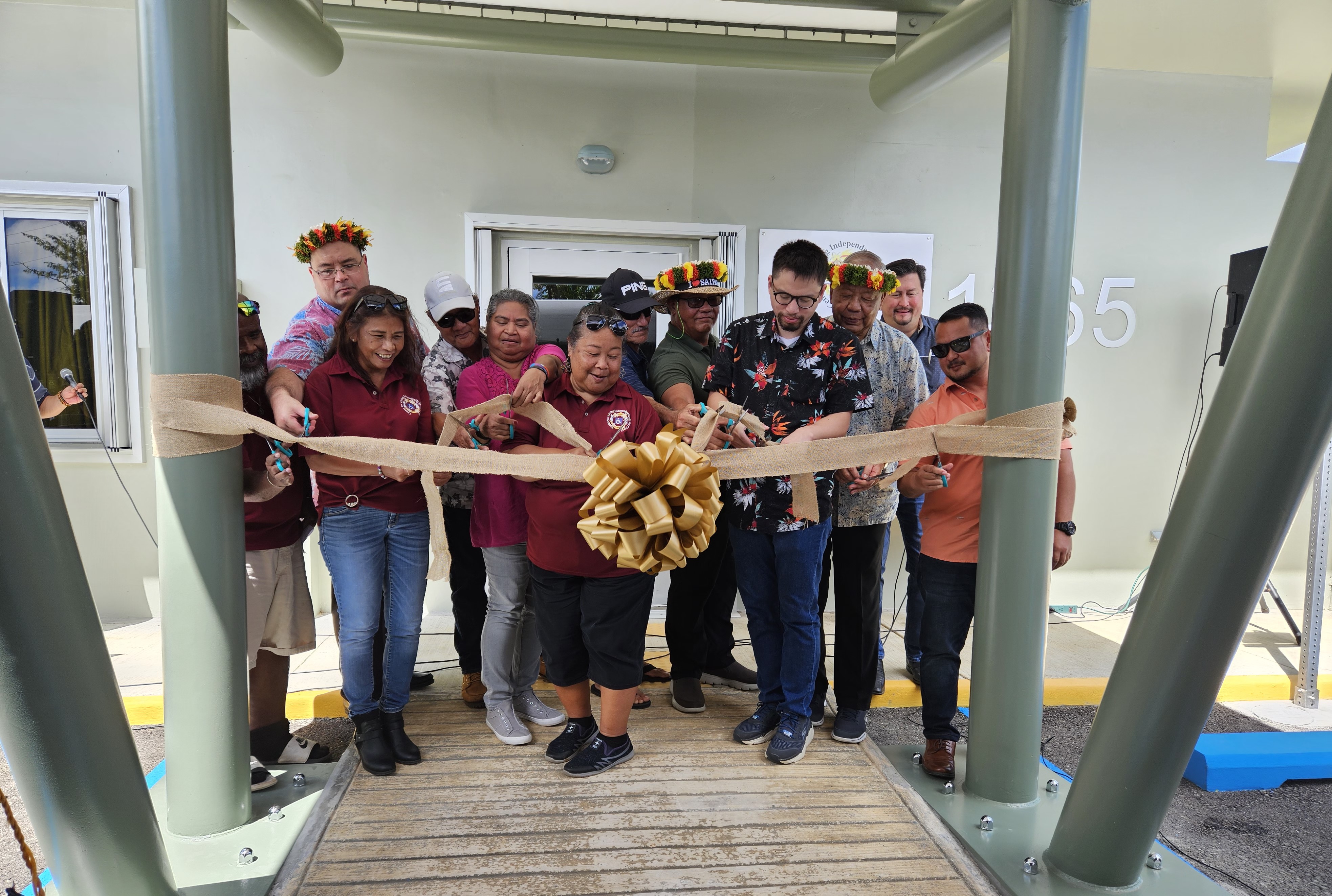 Center for Living Independently board members and CNMI officials cut the ceremonial ribbon of the one-stop disability training center on Capital Hill, Friday.