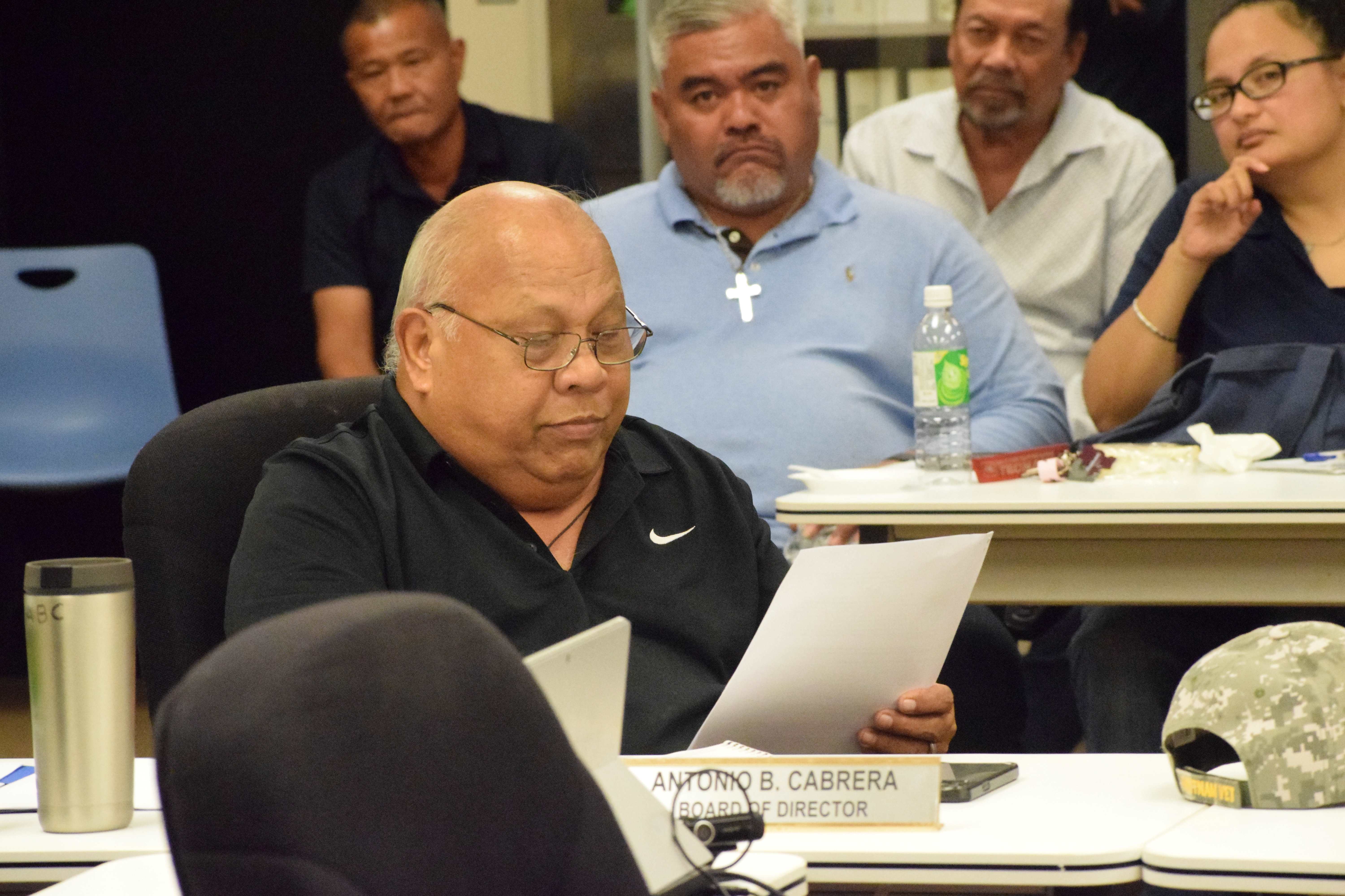 Commonwealth Ports Authority board member Antonio Cabrera reads his prepared statement during a special board meeting on Friday in the Aircraft Rescue and Fire Fighting classroom at Fransisco C. Ada/Saipan International Airport.