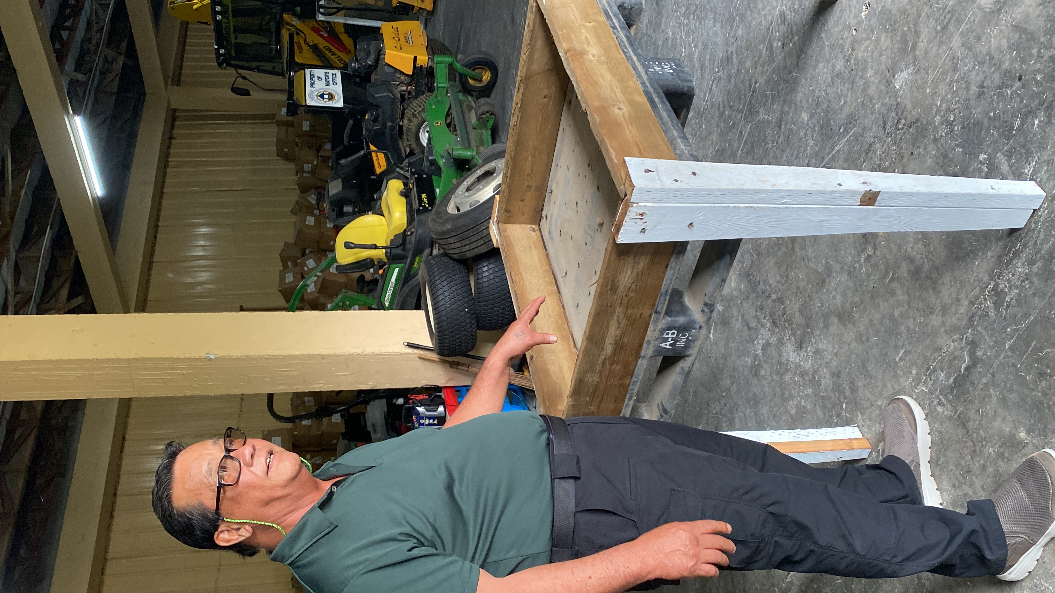 Saipan Mayor RB Camacho stands near a raised garden bed that will be donated to the Center for Living Independently.