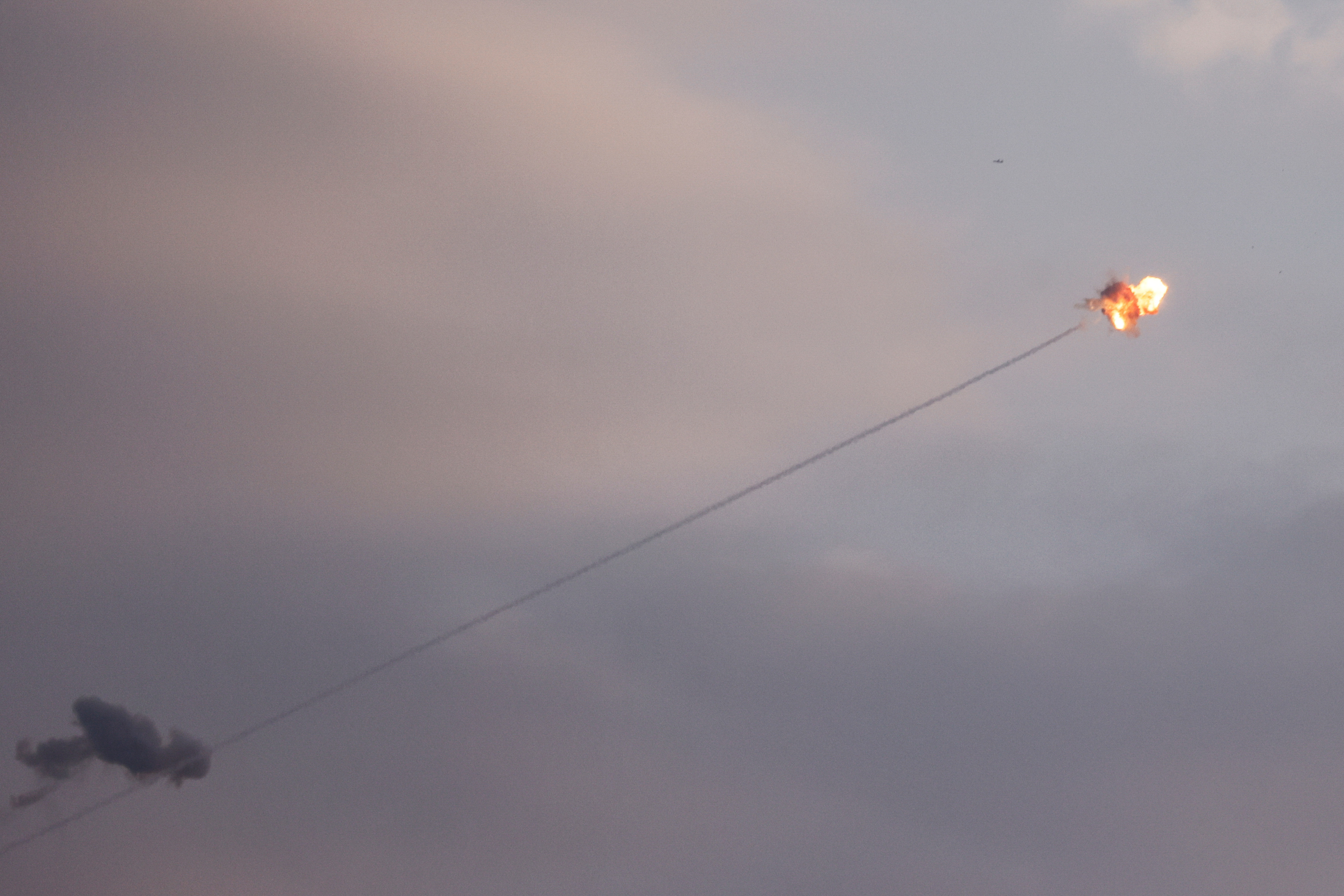 Israel's Iron Dome anti-missile system intercepts rockets launched from the Gaza Strip, as seen from the Israeli side of the border between Israel and the Gaza Strip, October 8, 2023. 
