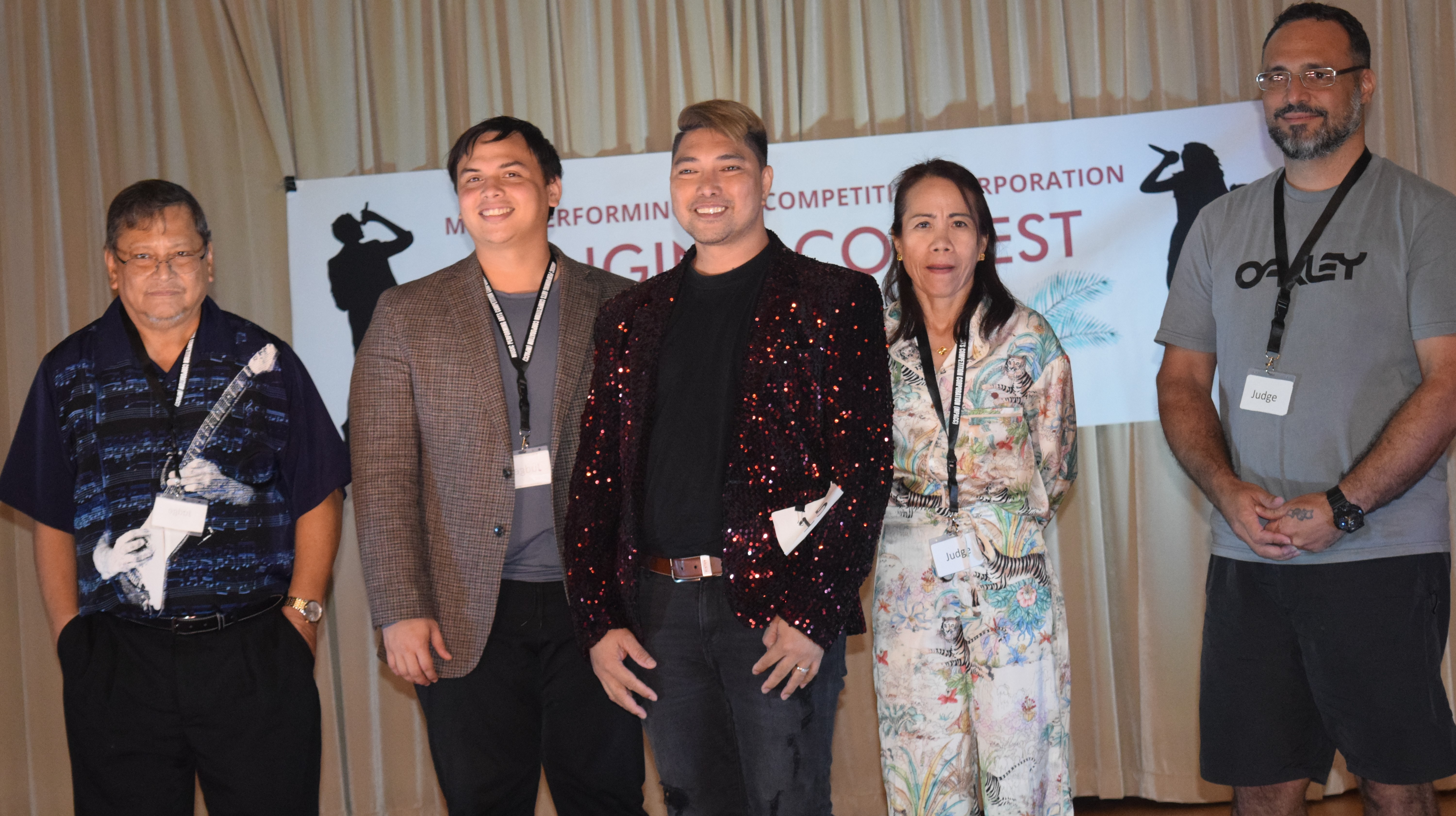 People's Choice awardee, Bench Legaspi, center, with the competition judges: Commonwealth Ports Authority board member Joseph Diaz, Public School System Social Studies program manager Vinnie Orsini, Rotary Club of Saipan President Irene Holl and Northern Marianas Humanities Council Executive Director Leo Pangelinan.