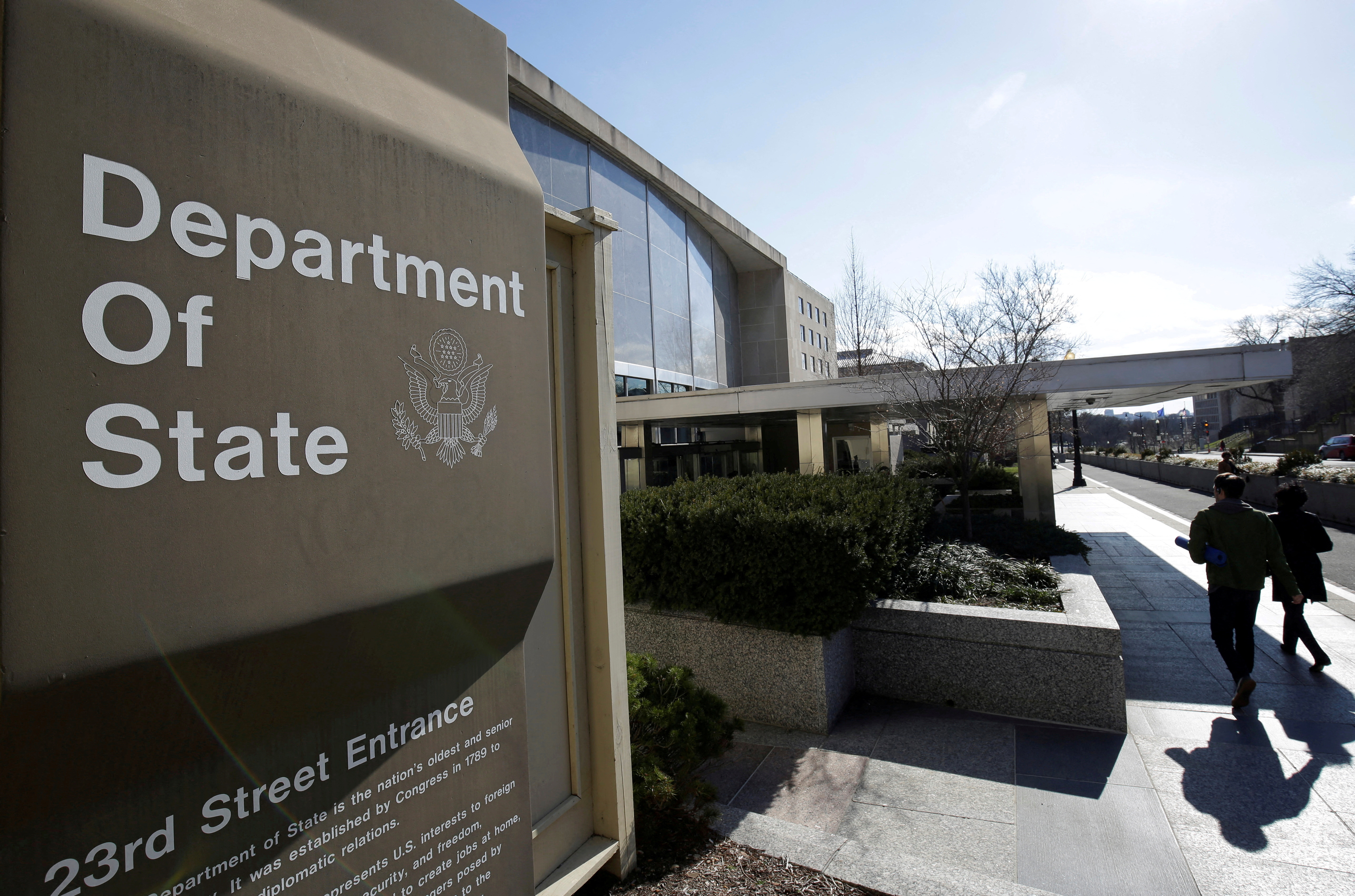 People enter the State Department Building in Washington, U.S., January 26, 2017. 