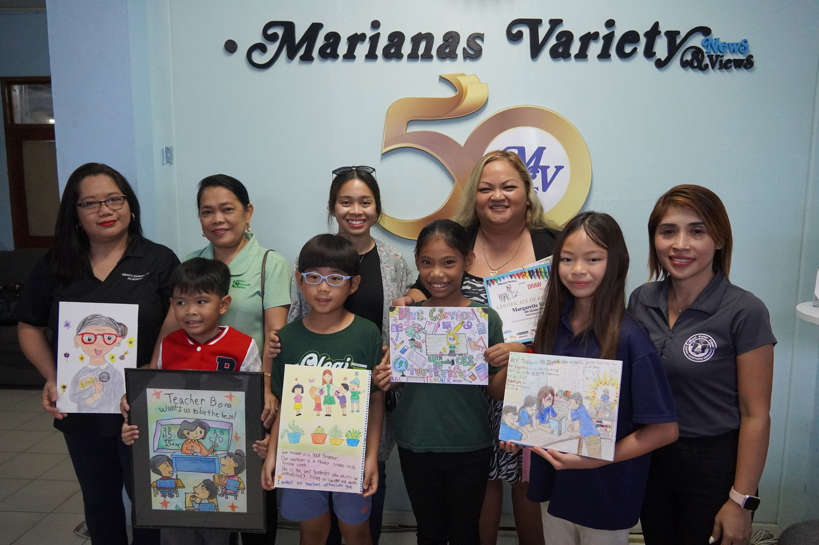(L-R) Cathy Merencilla, Colin Lilles, Yohan Jeong, Margarette Robonei, Sera Guerrero with parents and teachers.