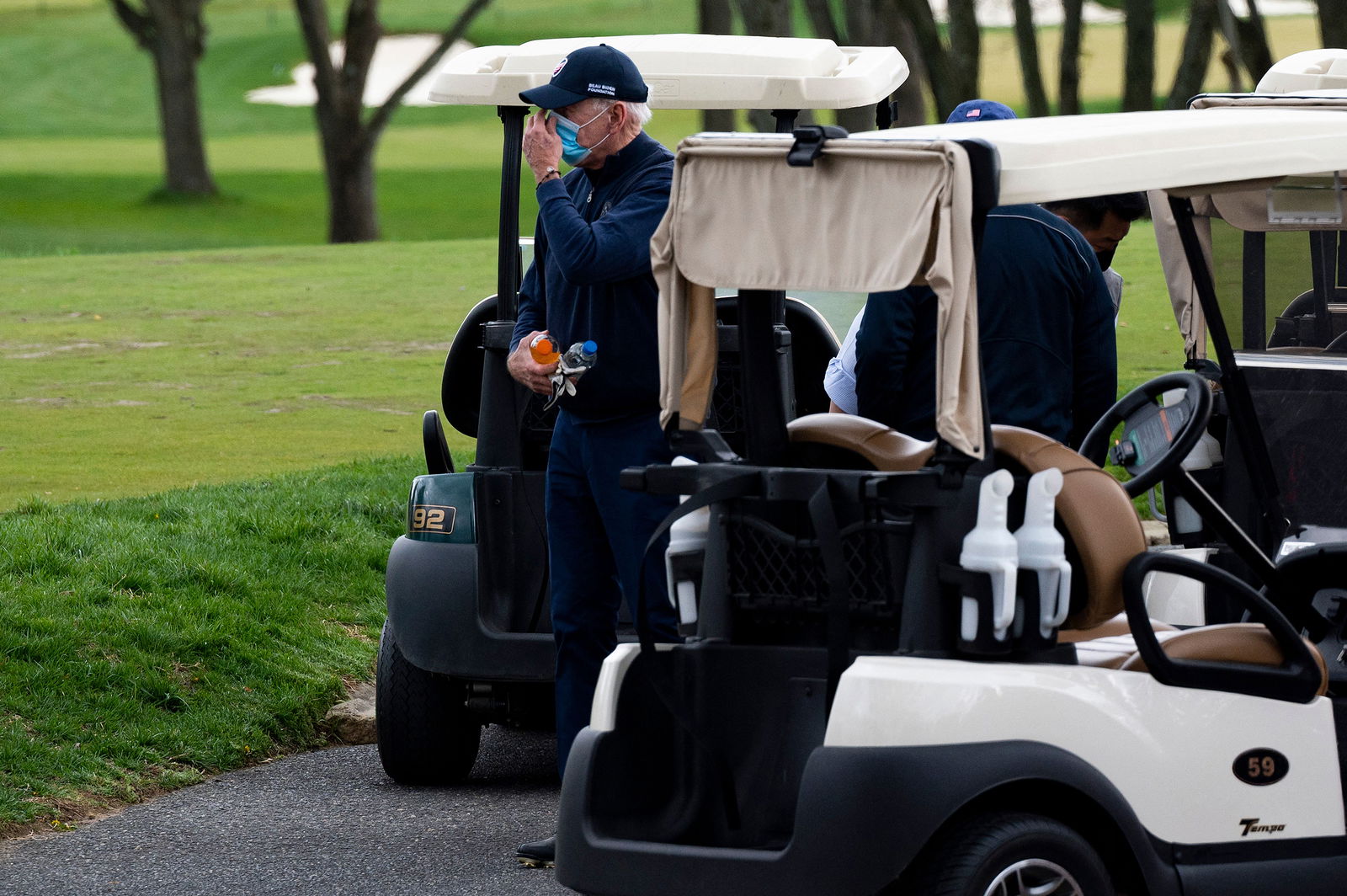 President Joe Biden leaves his cart after a round of golf at Wilmington Country Club in Wilmington, Delaware, on Saturday, April 17, 2021. A civilian aircraft that violated restricted airspace north of Wilmington prompted a security alert on Saturday, Oct. 28, 2023, as President Biden was spending the weekend in the area. (Jim Watson/AFP via Getty Images/TNS)