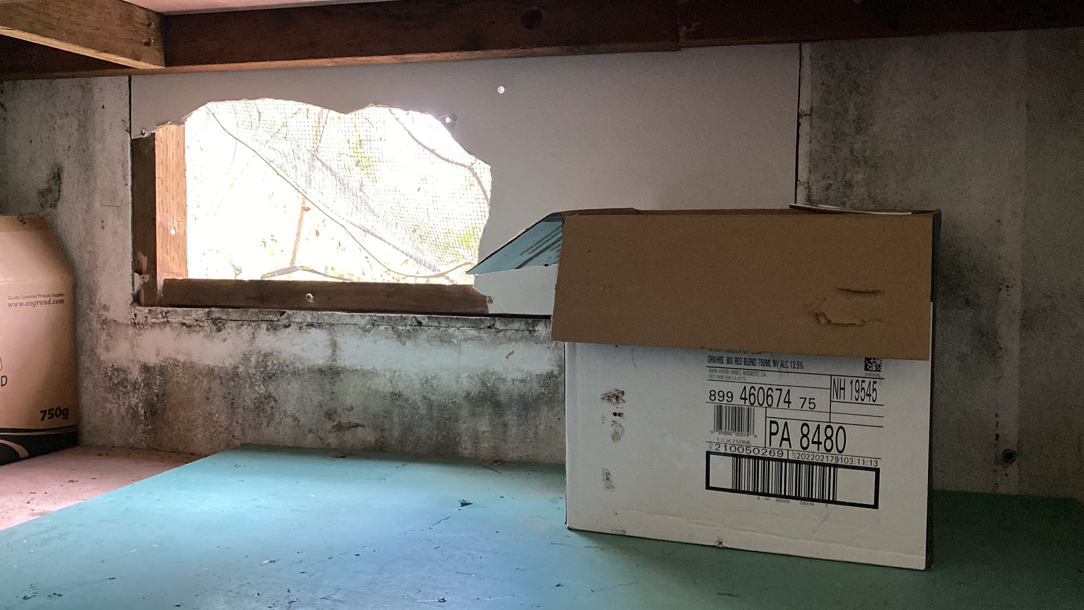 The burglars entered through this window to gain entry into Sip n Smile liquor store on Middle Road.