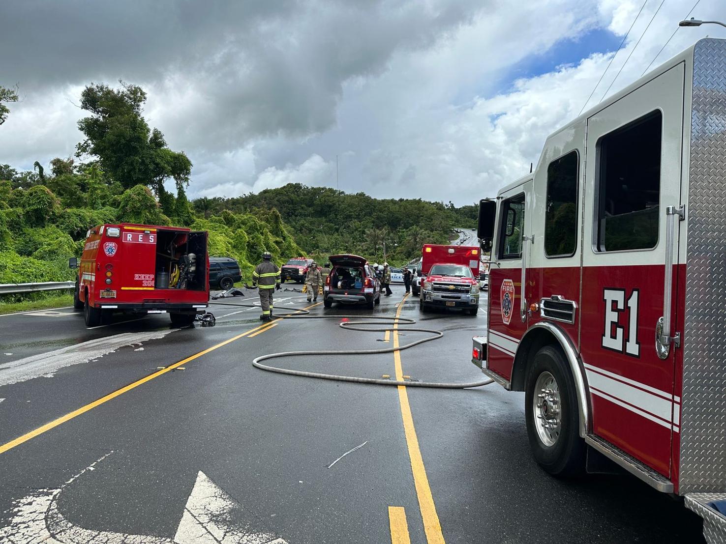 Guam Fire Department units arrive at the scene of a crash along Route 4 in Sinajana.