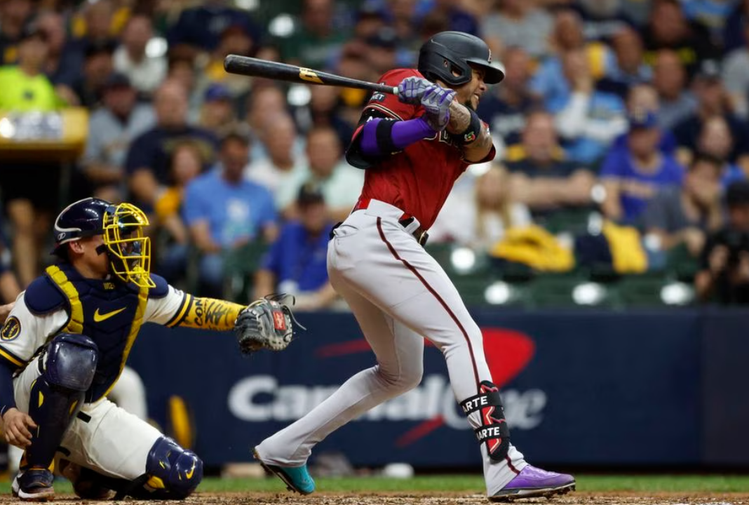 Arizona Diamondbacks second baseman Ketel Marte (4) hits a two RBI single in the sixth inning against the Milwaukee Brewers during game two of the Wildcard series for the 2023 MLB playoffs at American Family Field in Milwaukee, Wisconsin, Oct. 4, 2023.