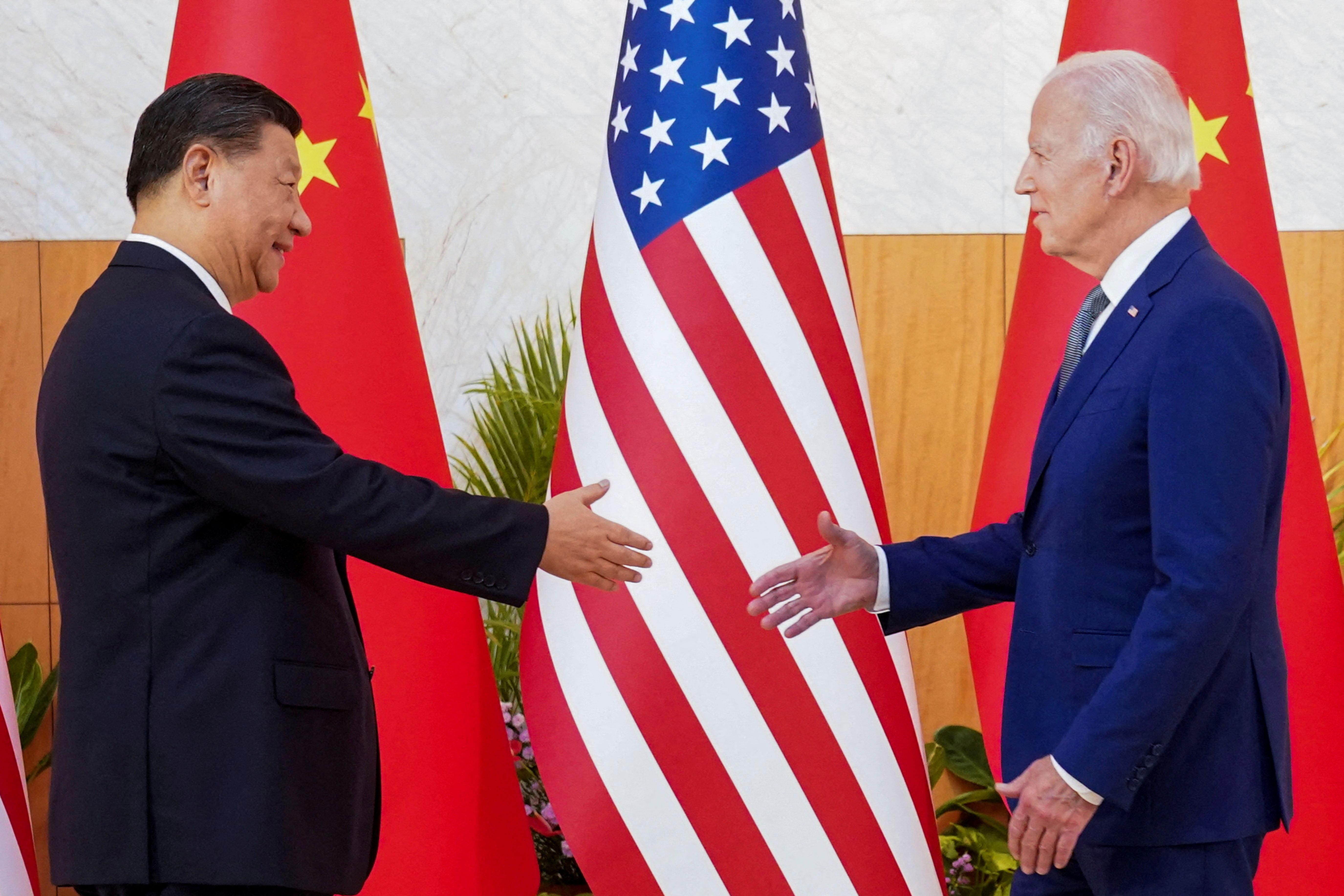 U.S. President Joe Biden meets with Chinese President Xi Jinping on the sidelines of the G20 leaders' summit in Bali, Indonesia, November 14, 2022. 