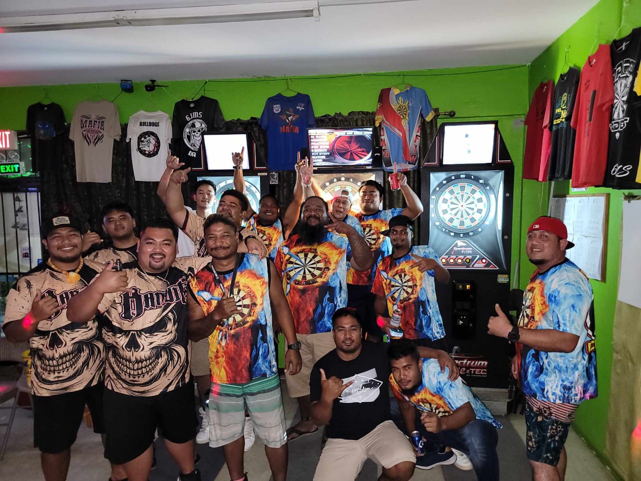 Tambayan G.V.D. Mix B and the 6JMS Bandits LatteB pose for a photo at the conclusion of their Bud Light Cup championship match in the Latte Stone B Division of the 2023 SEDA Bud Light Dart League at 6JMS Sports Bar on Tuesday.