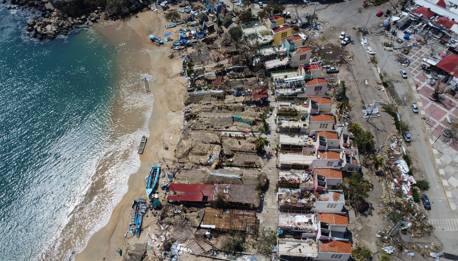 Damaged buildings are seen by the Caleta beach in the aftermath of Hurricane Otis, in Acapulco, Mexico, October 29, 2023. 