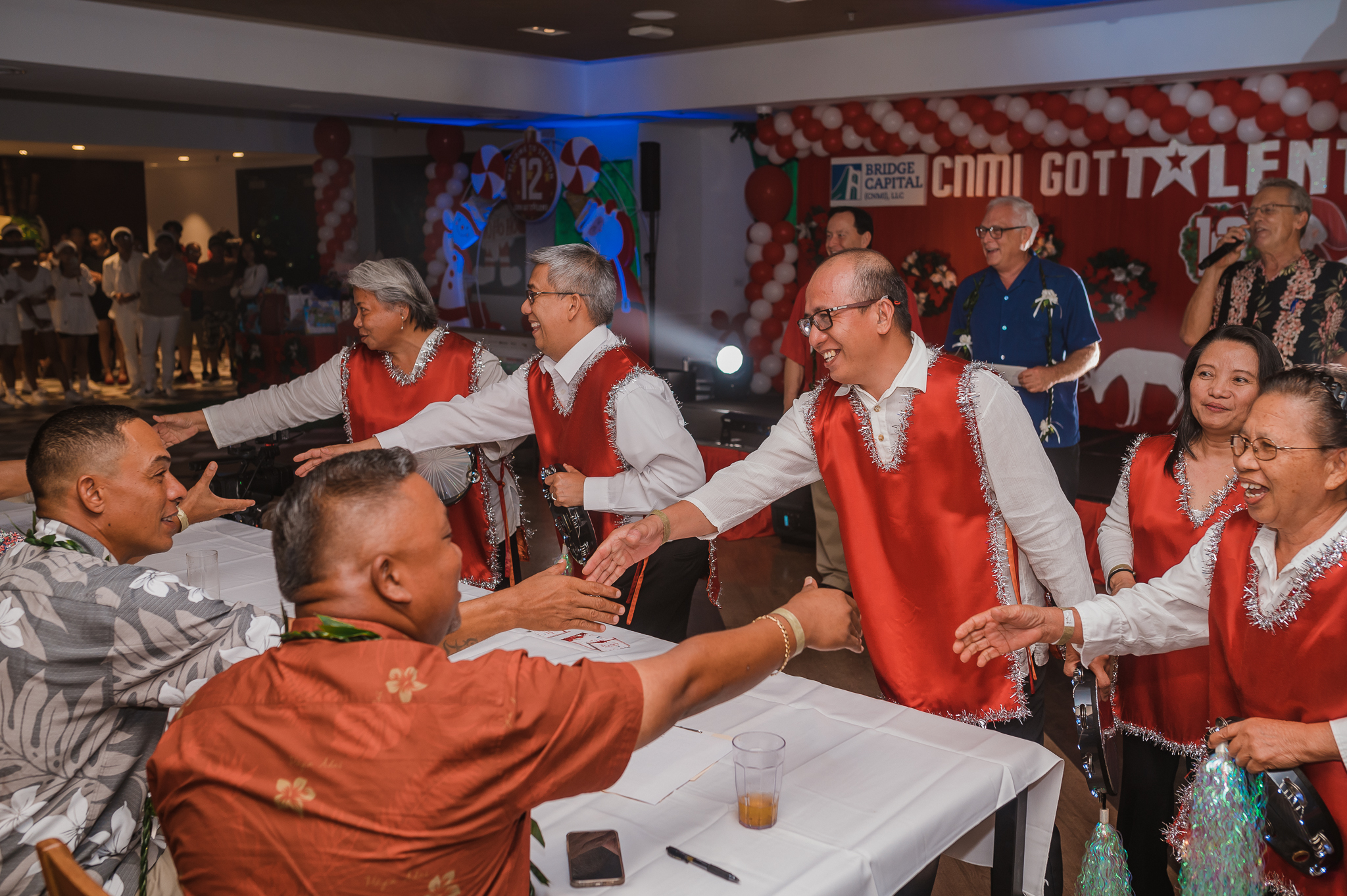 Grace Christian Assembly's tambourine team members, who took home a special category prize, shake the judges’ hands at last year's CNMI's Got Talent.