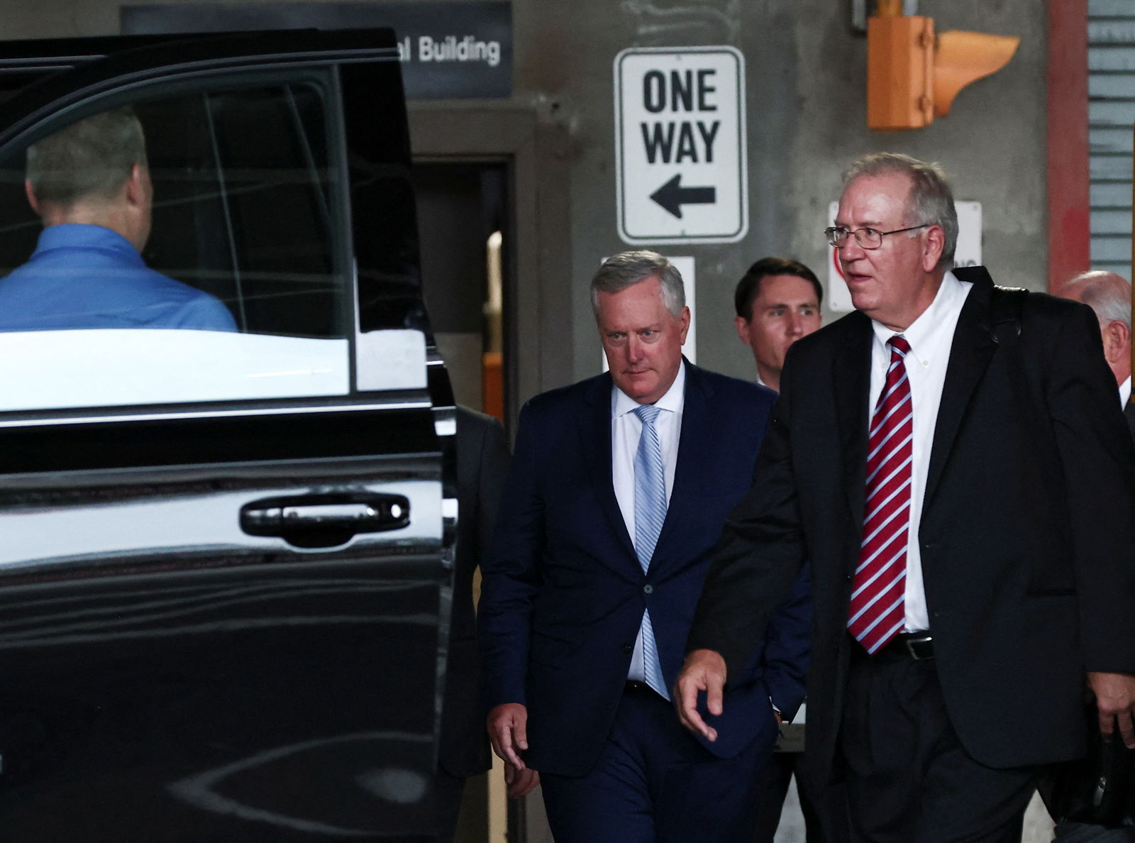 Former U.S. President Donald Trump's Chief of Staff Mark Meadows walks out of the United States District Court for the Northern District of Georgia, where a hearing on his petition to move the Fulton County case to federal court in the 2020 election case took place, in Atlanta, Georgia, U.S., August 28, 2023. 