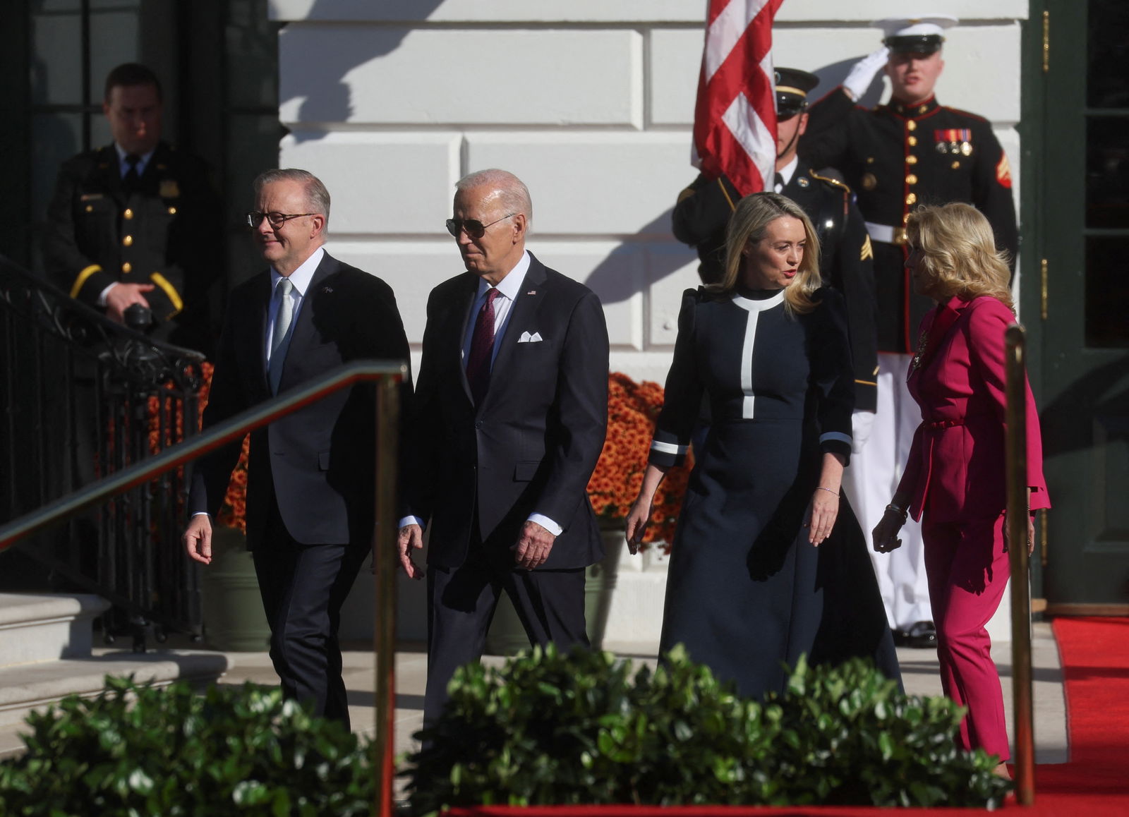 U.S. President Joe Biden and first lady Jill Biden walk with Australia’s Prime Minister Anthony Albanese and his partner Ms. Jodie Haydon as they arrive for an official White House State Arrival ceremony on the South Lawn of the White House in Washington, U.S., October 25, 2023. 