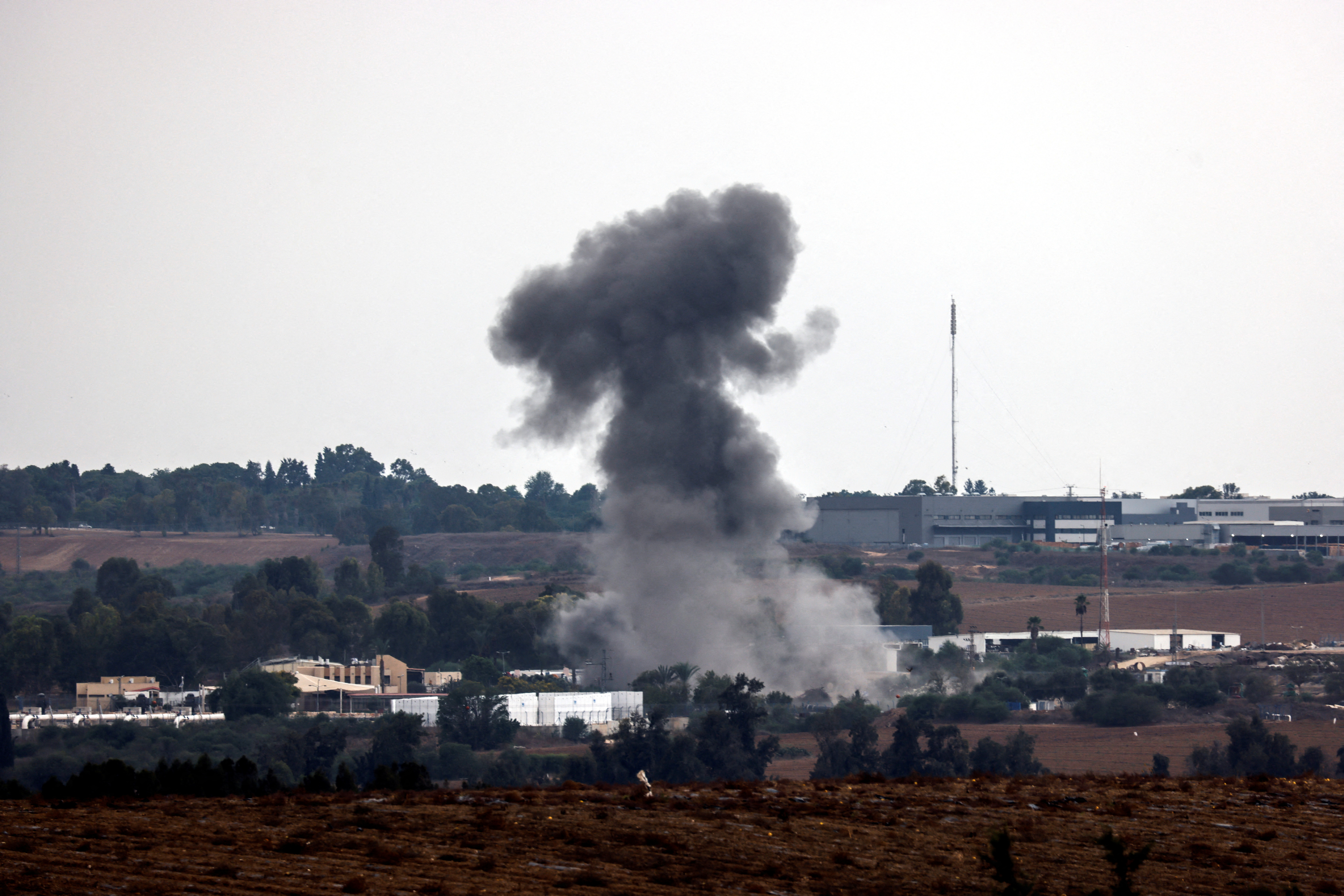 A rocket launched from the Gaza Strip strikes an area near Sderot, southern Israel October 9, 2023. 