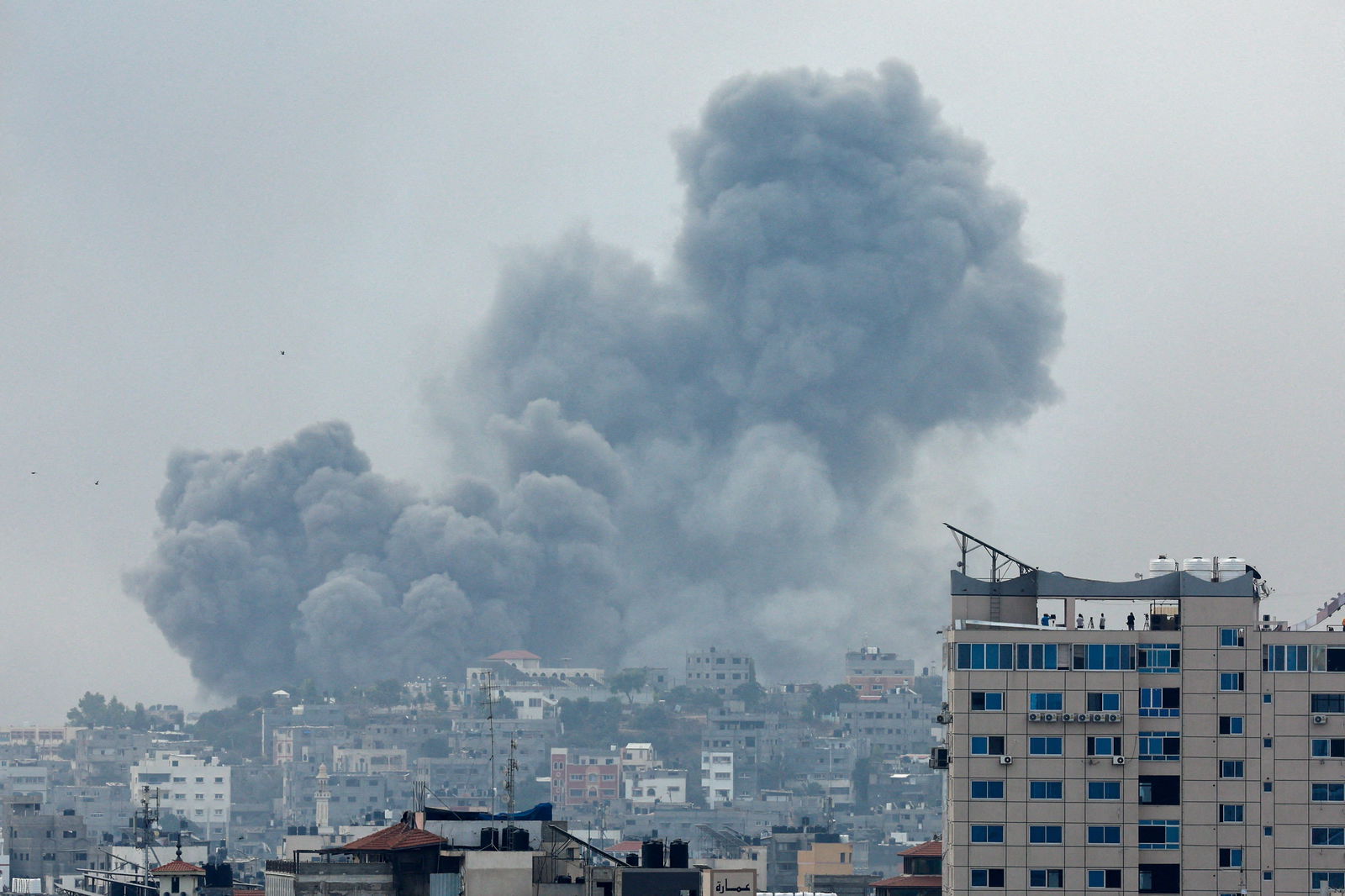 Smoke rises following Israeli strikes in Gaza, October 9, 2023. 