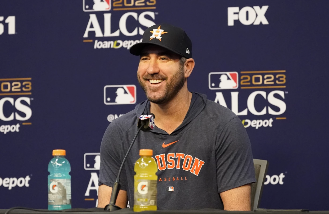 Houston Astros starting pitcher Justin Verlander smiles during a news conference before a baseball practice in Houston, Saturday, Oct. 14, 2023.