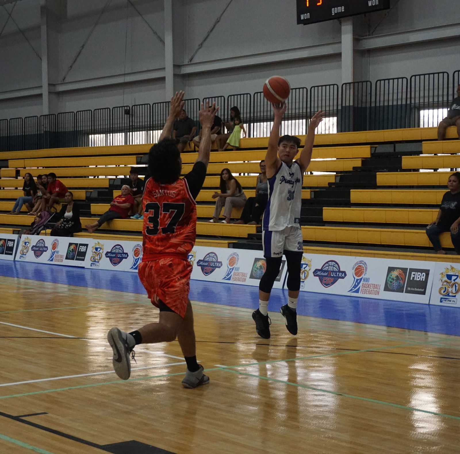 Priority Care's Steve King takes the contested three-pointer during a game against Docomo in the 2023 R&J Wine and Liquor Inter-Government/Business League at the  Ada gym on Saturday.