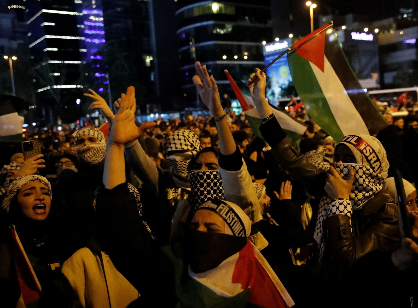 Pro-Palestinian demonstrators shout slogans during a protest near the Israeli Consulate as the conflict between Israel and Hamas continues, in Istanbul, Turkey October 18, 2023. 