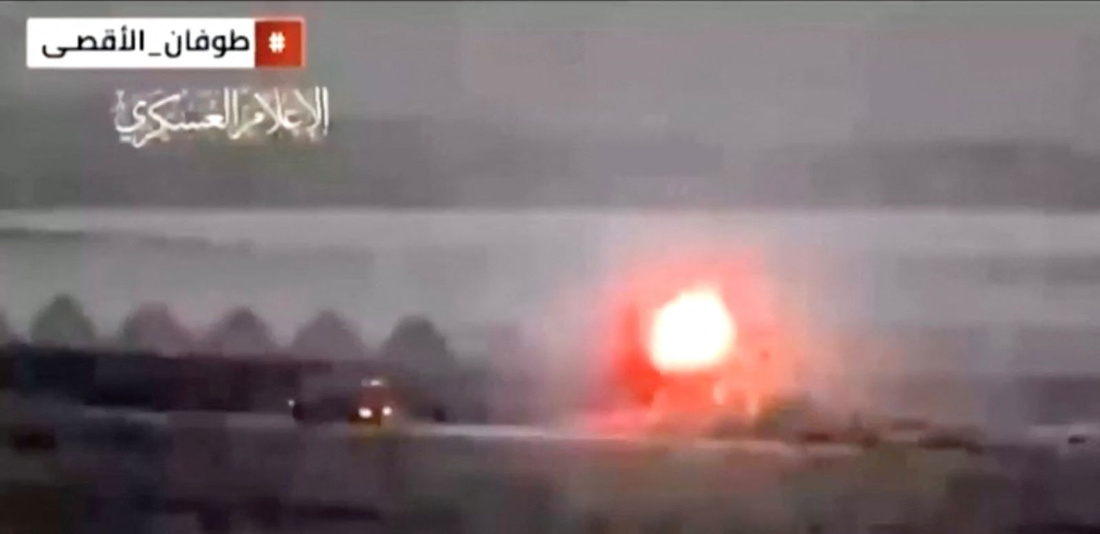 Still image from Hamas military wing footage claiming to show a rocket hitting an Israeli armoured carrier, amid the ongoing conflict between Israel and the Palestinian Islamist group Hamas, at a location given as near the Israel-Gaza border, released October 28, 2023. 