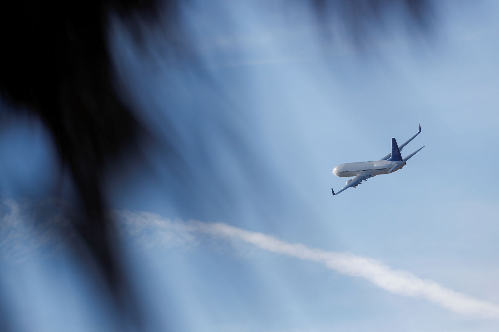 An aircraft carrying Venezuelan migrants, who will be repatriated as part of an immigration enforcement process, departs from the Valley International Airport, in Harlingen, Texas, U.S. October 18, 2023. 