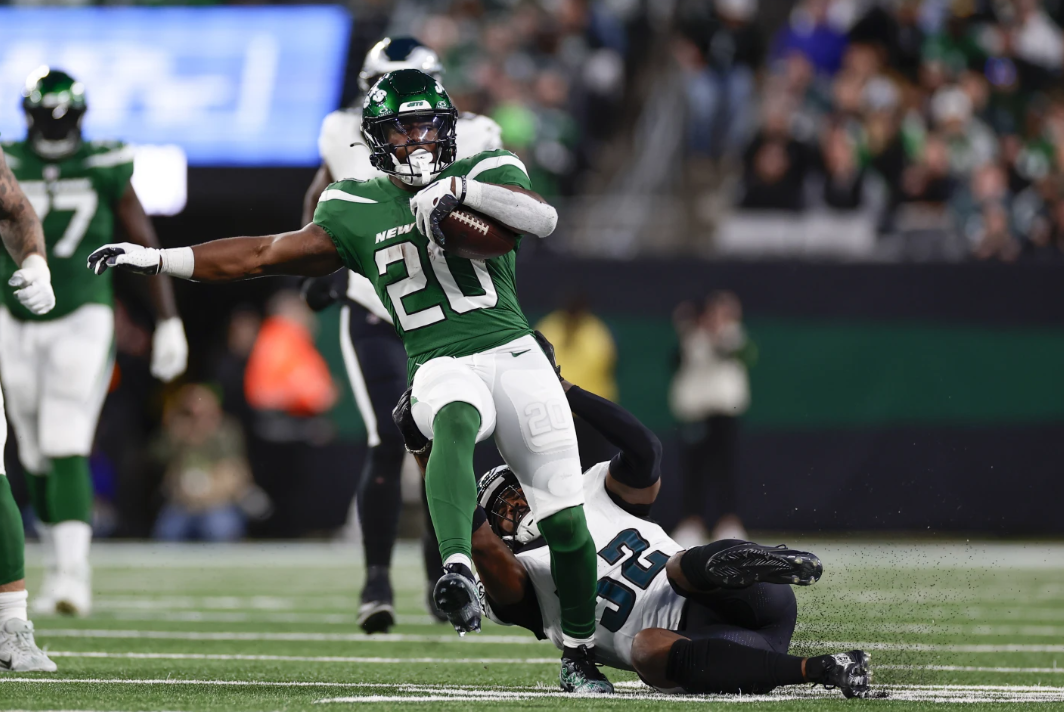 New York Jets’ Breece Hall, left, is tackled by Philadelphia Eagles’ Zach Cunningham during the second half of an NFL game, Sunday, Oct. 15, 2023 in East Rutherford, N.J.