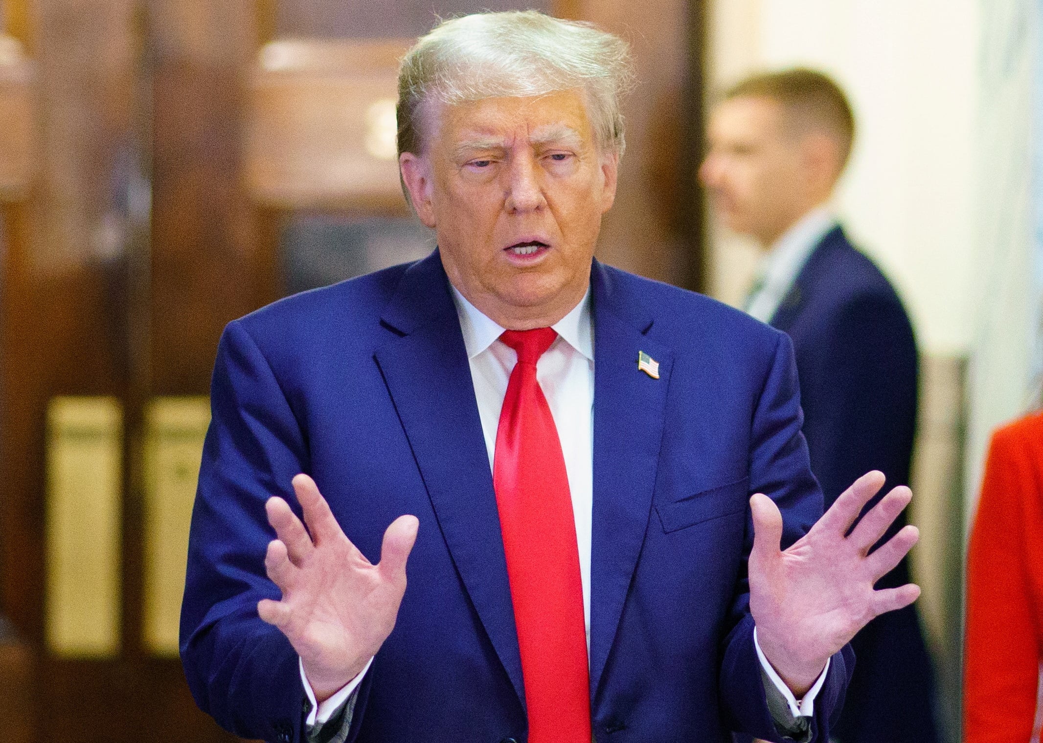 Former U.S. President Donald Trump speaks at a Manhattan courthouse, where he attends the trial of himself, his adult sons, the Trump Organization and others in a civil fraud case brought by state Attorney General Letitia James, in New York City, U.S., October 3, 2023. 