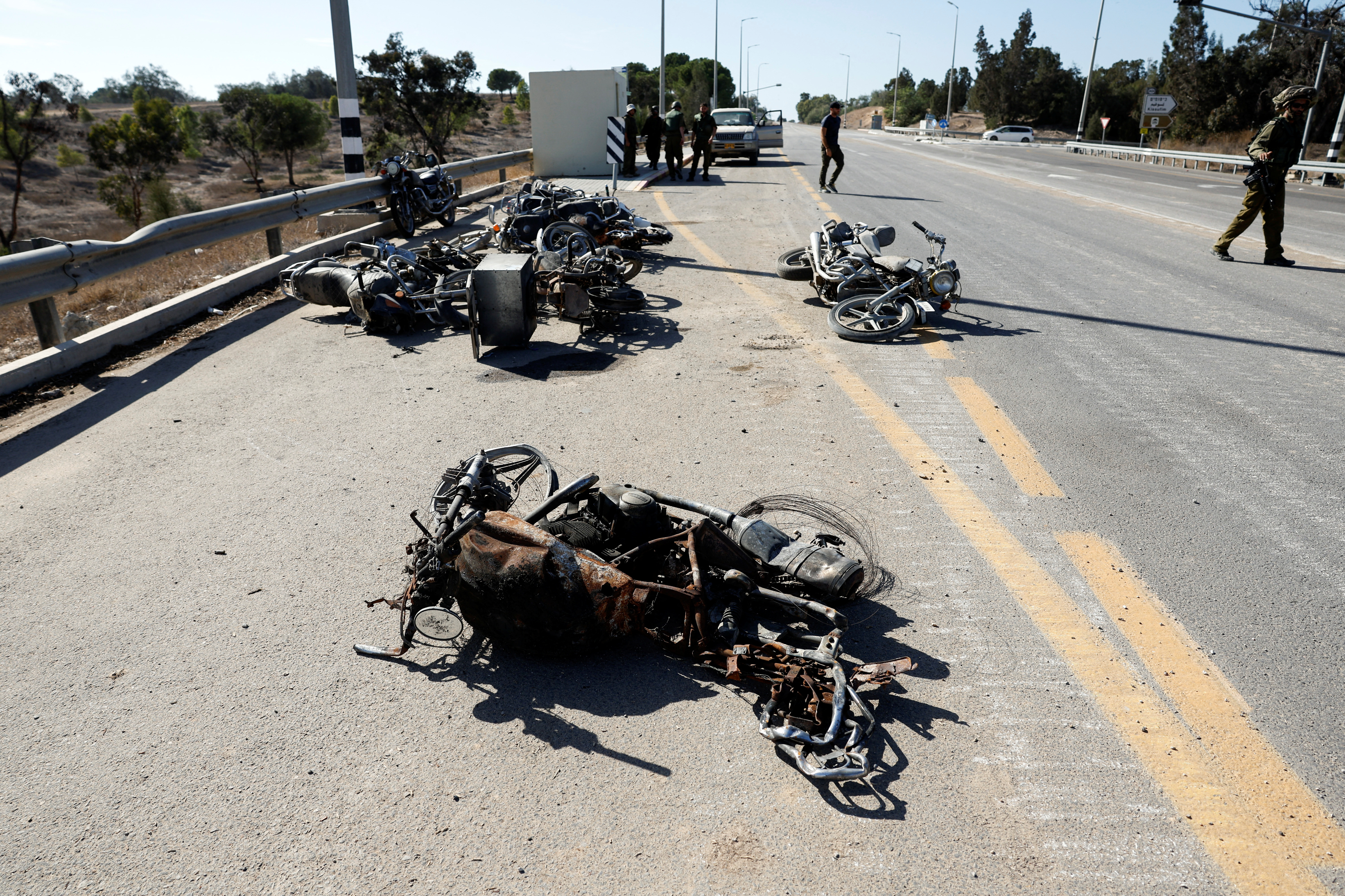 The remains of motorbikes used by Palestinians who were part of a deadly infiltration by Hamas gunmen from the Gaza Strip, in Kibbutz Kissufim in southern Israel October 21, 2023. 