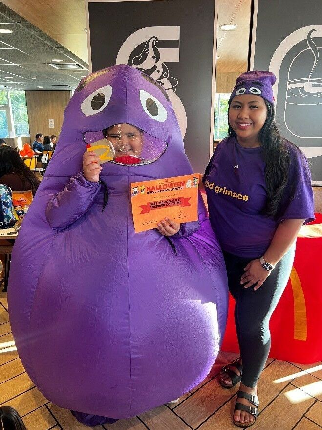 Best McDonald’s Inspired Costume winner, Leonardo Vincent, poses as the lovable, purple McDonald’s character Grimace.