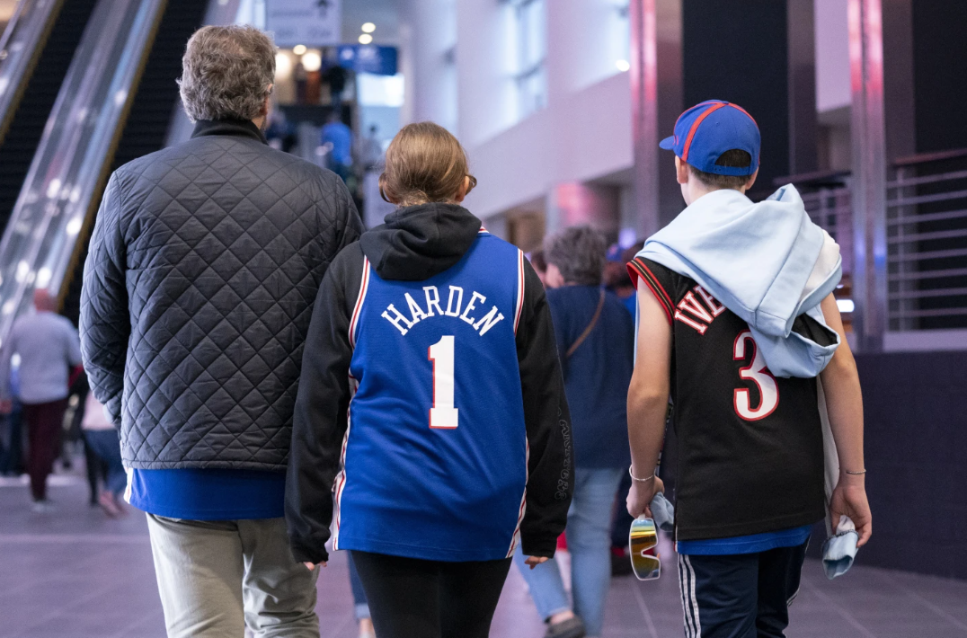 A Philadelphia 76ers fan wears a James Harden jersey prior to a preseason NBA game against the Atlanta Hawks, Friday, Oct. 20, 2023 in Philadelphia.