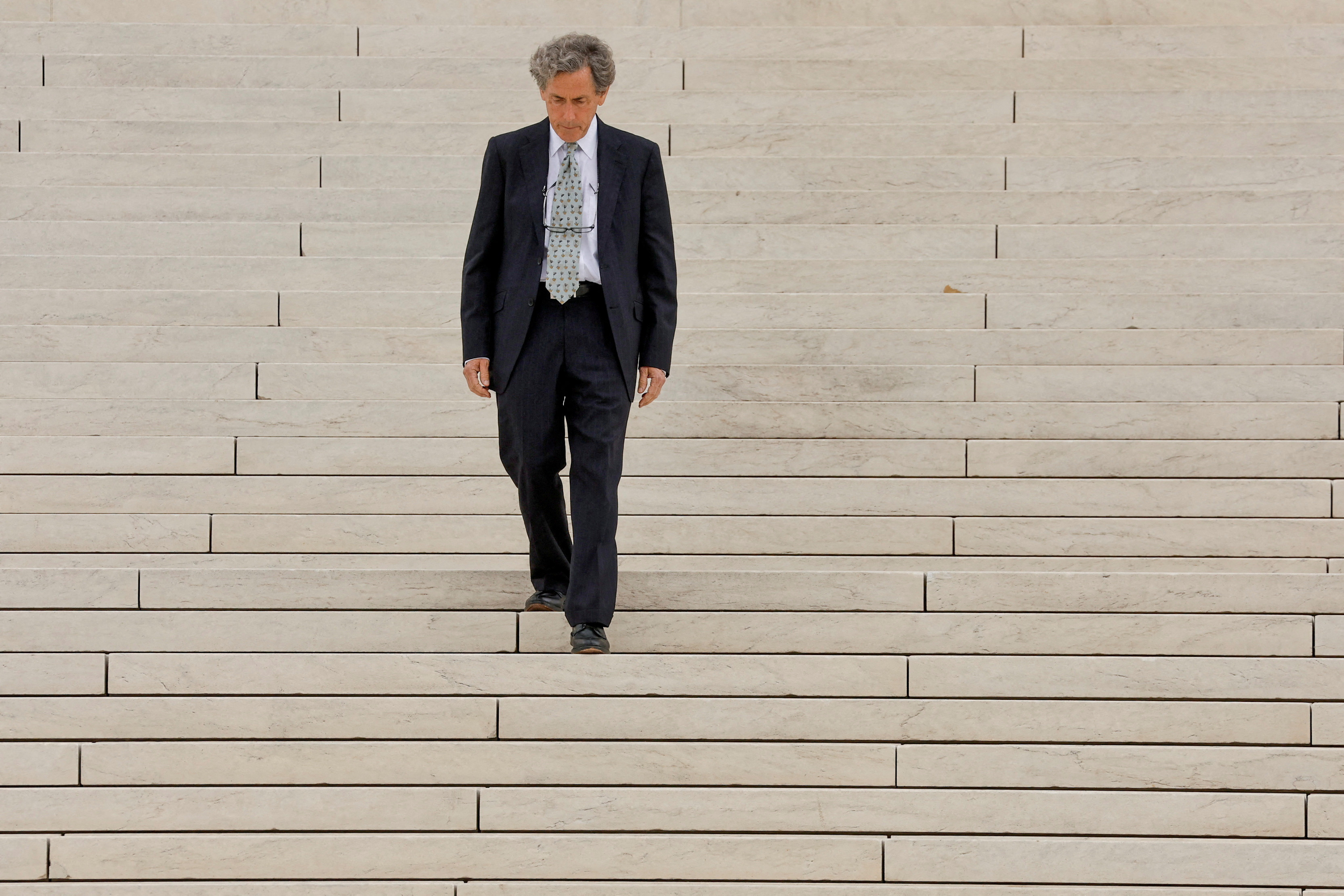 Anti-affirmative action activist Edward Blum departs after the U.S. Supreme Court heard appeals in two cases brought by an organization he founded on the legality of race-conscious admissions policies involving Harvard University and the University of North Carolina, outside the U.S. Supreme Court building in Washington, U.S. October 31, 2022. 