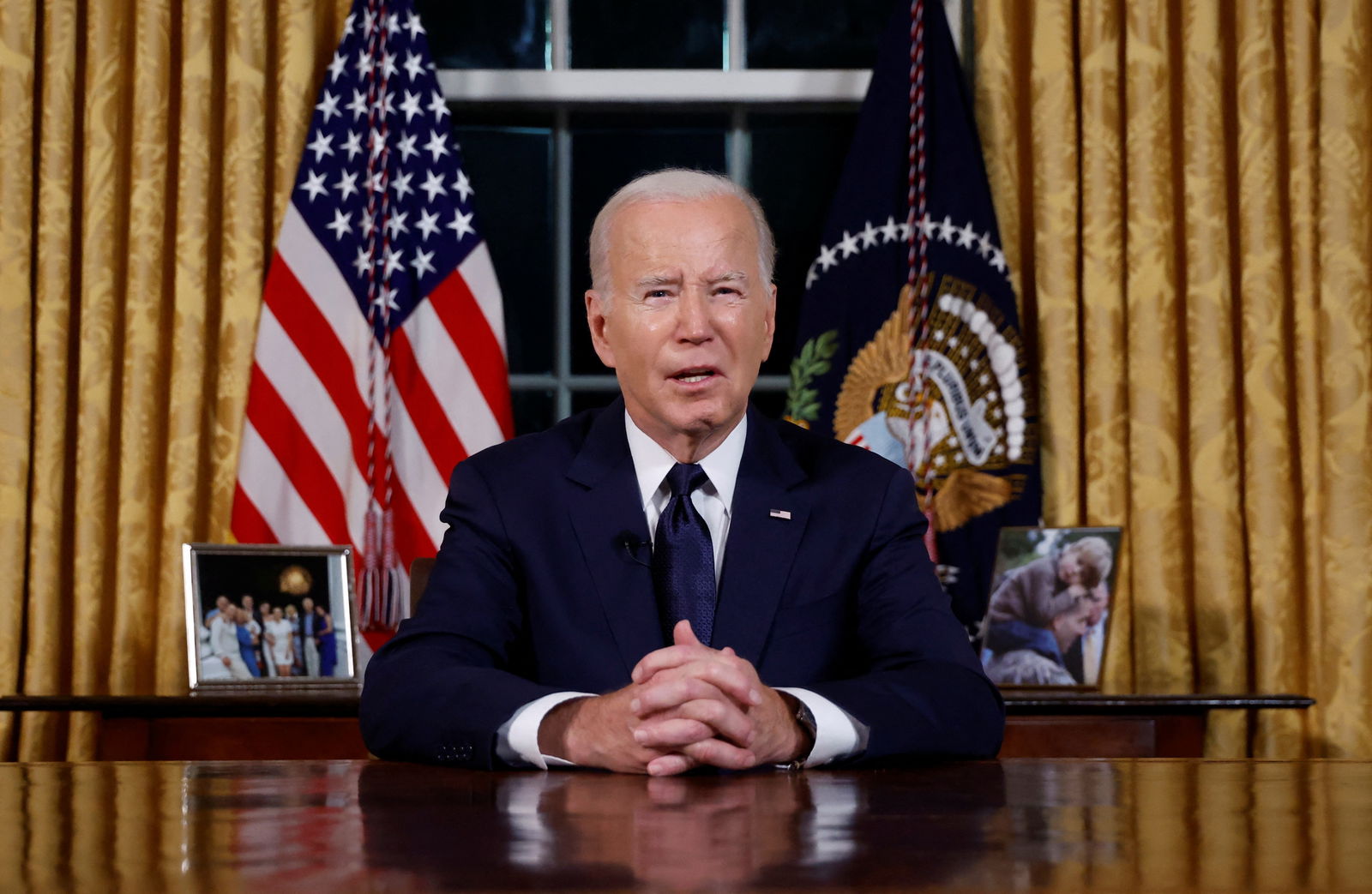 U.S. President Joe Biden delivers a prime-time address to the nation about his approaches to the conflict between Israel and Hamas, humanitarian assistance in Gaza and continued support for Ukraine in their war with Russia, from the Oval Office of the White House in Washington, U.S. October 19, 2023. 