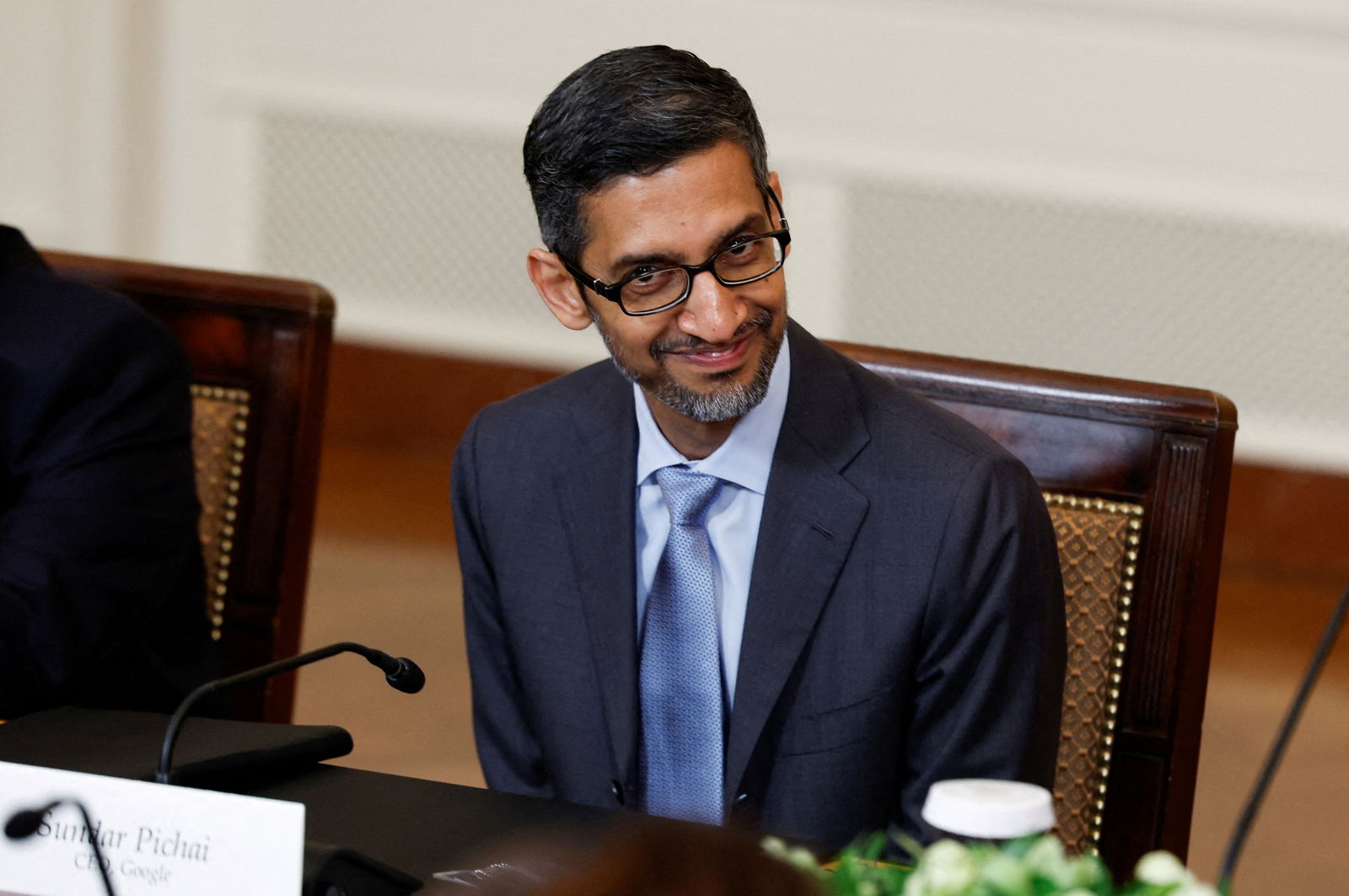 Sundar Pichai, CEO of Google, reacts during a meeting with U.S. President Joe Biden, India's Prime Minister Narendra Modi and senior officials and CEOs of American and Indian companies in the East Room of the White House in Washington, U.S., June 23, 2023. 