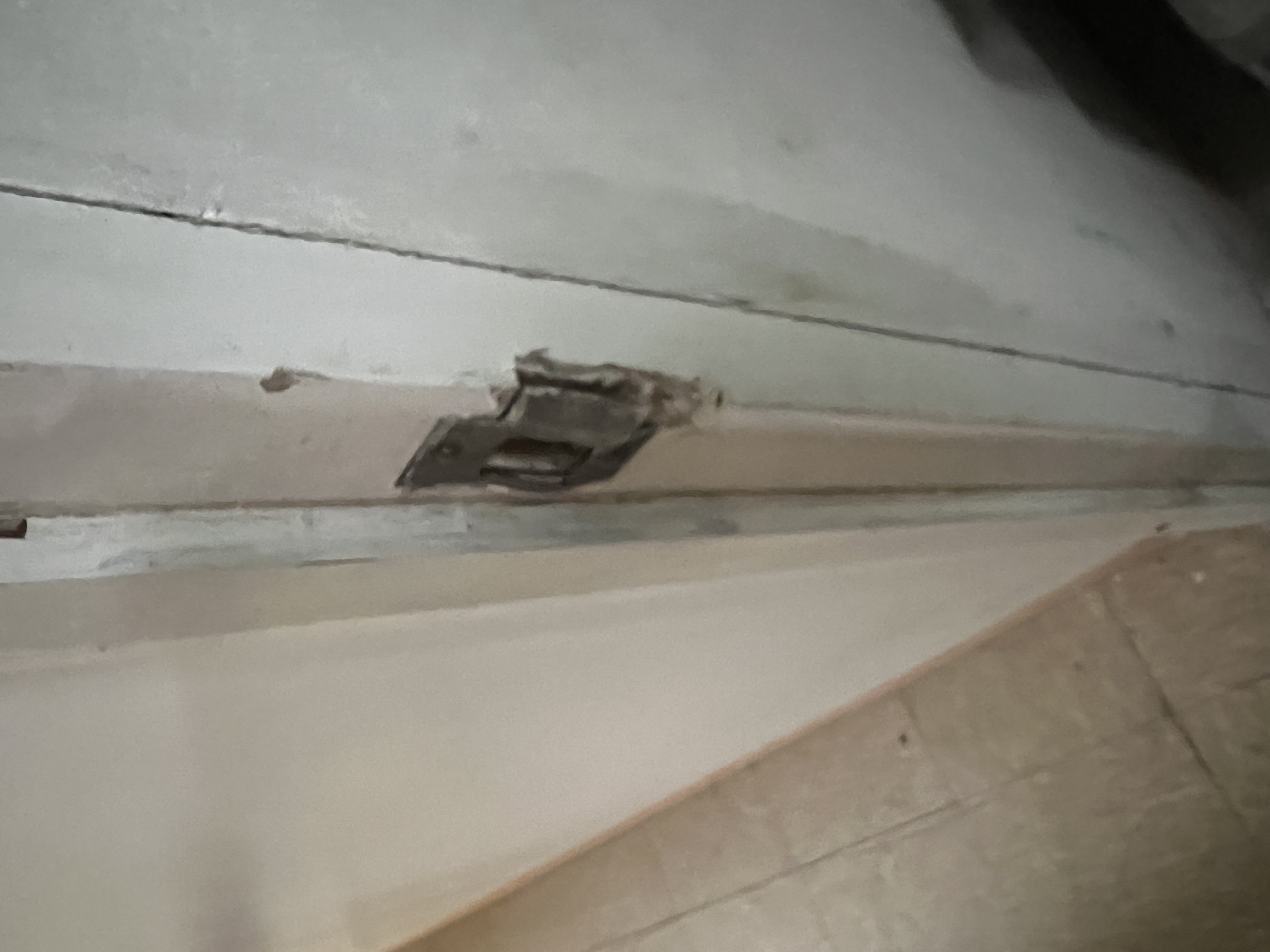 A door frame damaged by the burglars.