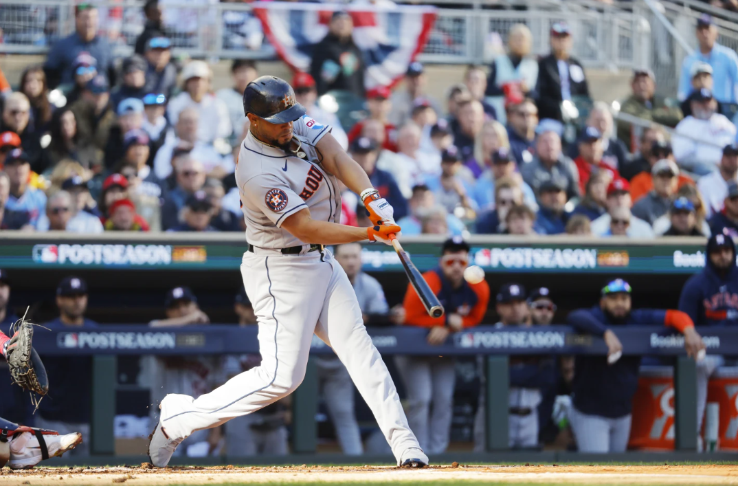 Houston Astros’ Jose Abreu connects for a three-run home run in the first inning during Game 3 of an American League Division Series baseball game against the Minnesota Twins, Tuesday, Oct. 10, 2023 in Minneapolis.