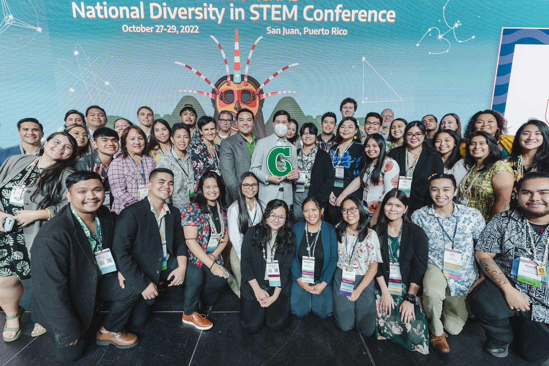 Attendees pause for a photo at the 2022 SACNAS National Diversity in STEM Conference held in Puerto Rico. 