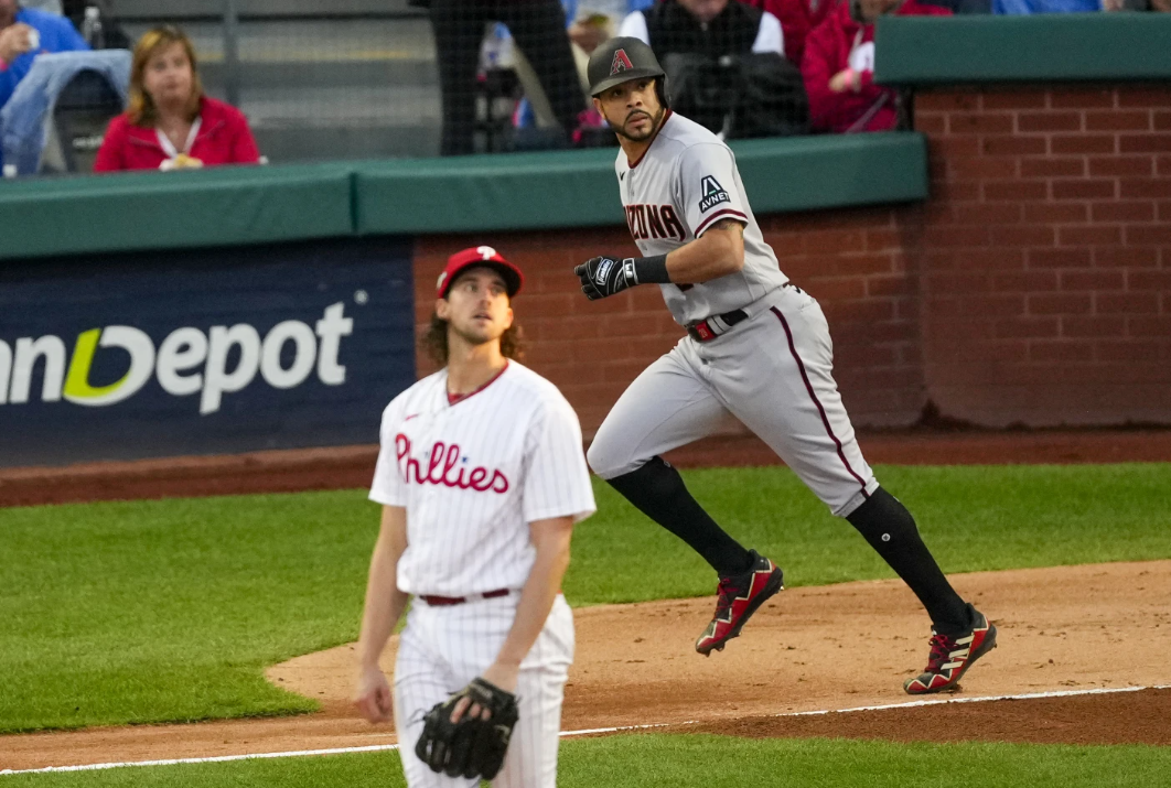 Arizona Diamondbacks’ Tommy Pham watches his home run off Philadelphia Phillies starting pitcher Aaron Nola during the second inning in Game 6 of the NL Championship Series in Philadelphia Monday, Oct. 23, 2023.