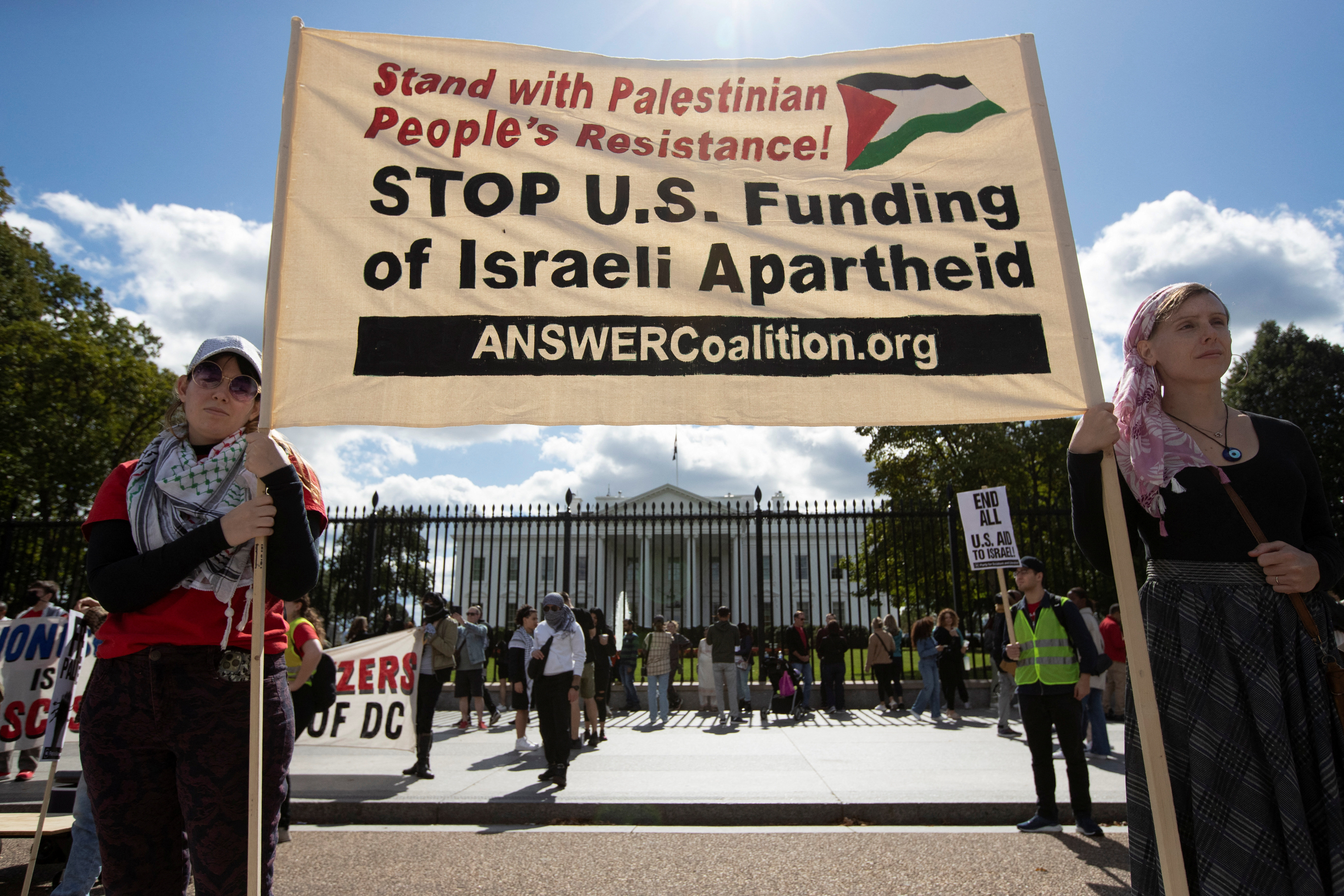 Supporters of the Palestinian people from the Palestinian Youth Movement and other groups demonstrate outside the White House about the conflict between Israel and Hamas, during a protest in Washington, U.S., October 8, 2023. 