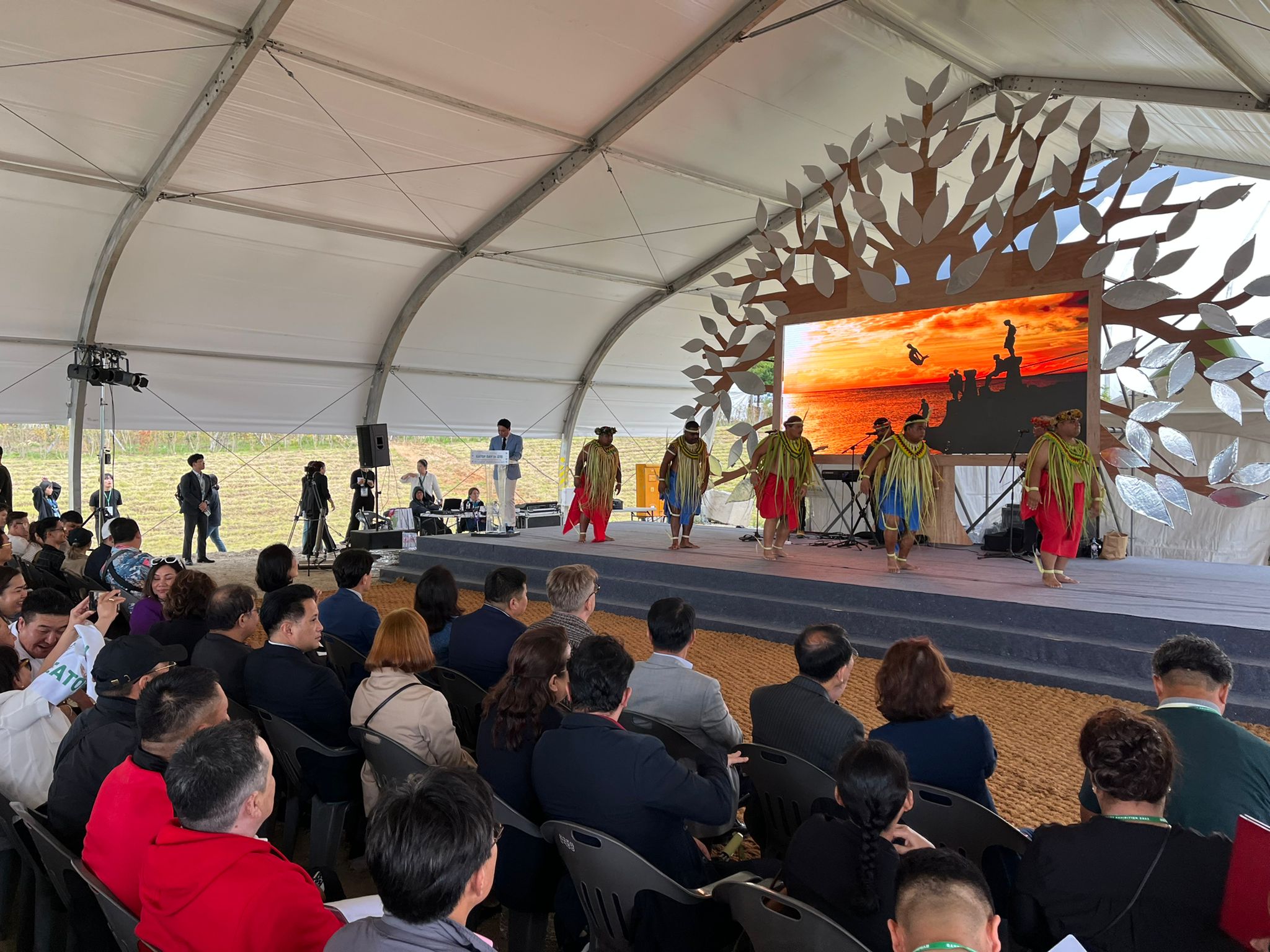Carolinian dance troupe Island Warriors, adorned with coconut fronds, perform at the opening of the Gangwon Forestry Exhibition in South Korean on Sept. 23, 2023.  The Marianas Visitors Authority attended the exhibition opening.