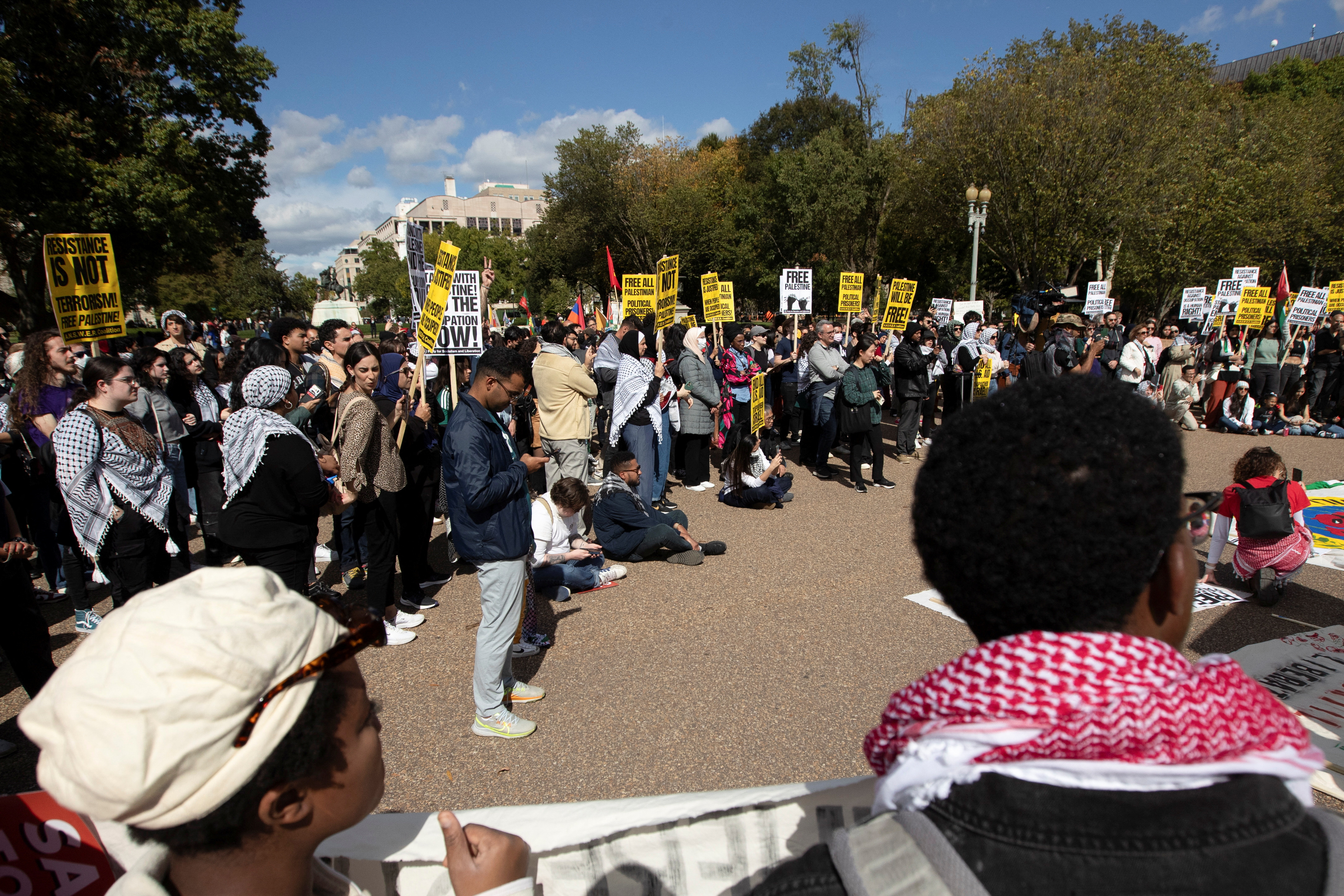 Supporters of the Palestinian people from the Palestinian Youth Movement and other groups demonstrate outside the White House about the conflict between Israel and Hamas, during a protest in Washington, U.S., October 8, 2023. 