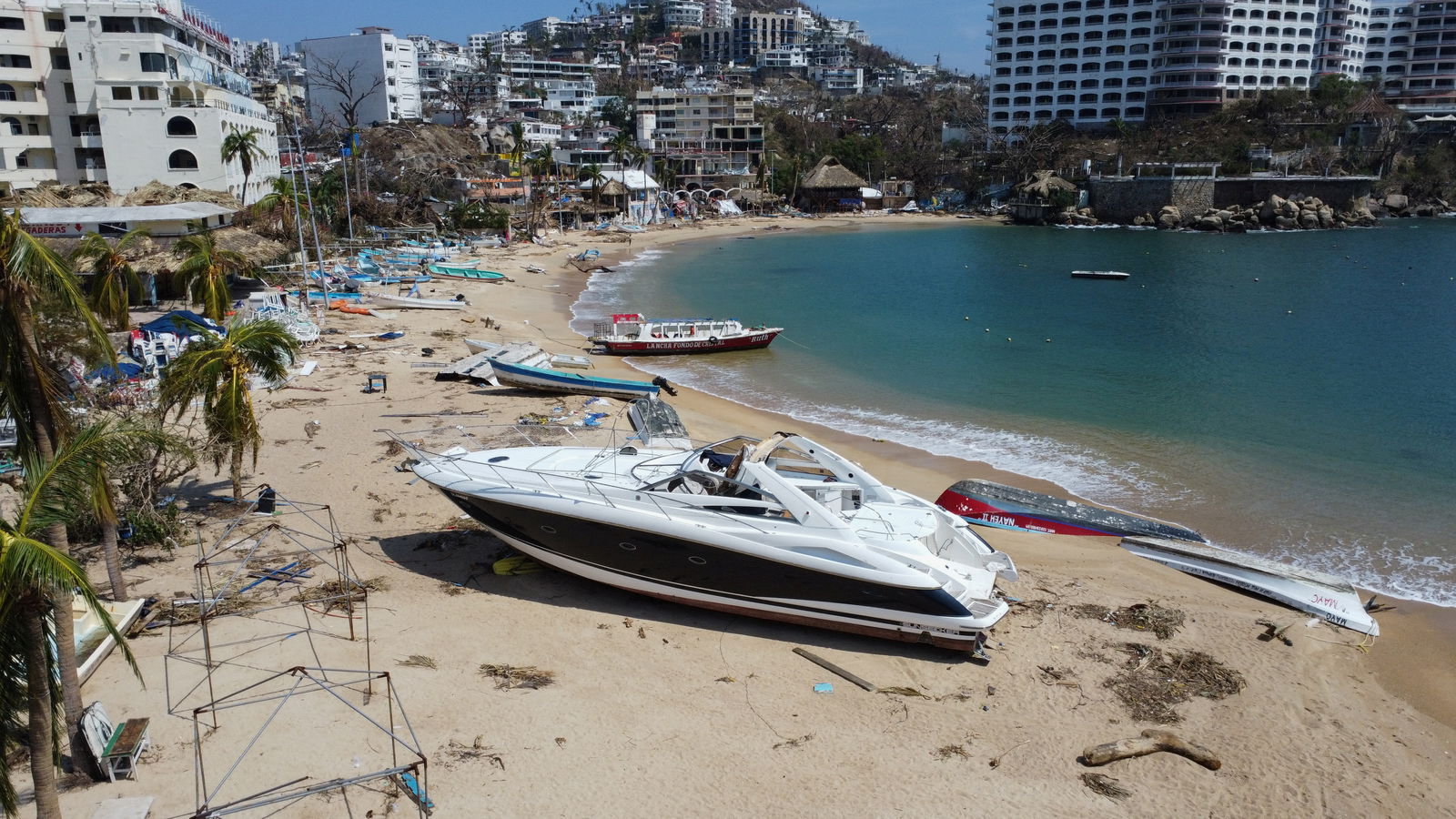 Damaged boats are seen at the Caleta beach in the aftermath of Hurricane Otis, in Acapulco, Mexico, October 29, 2023. 