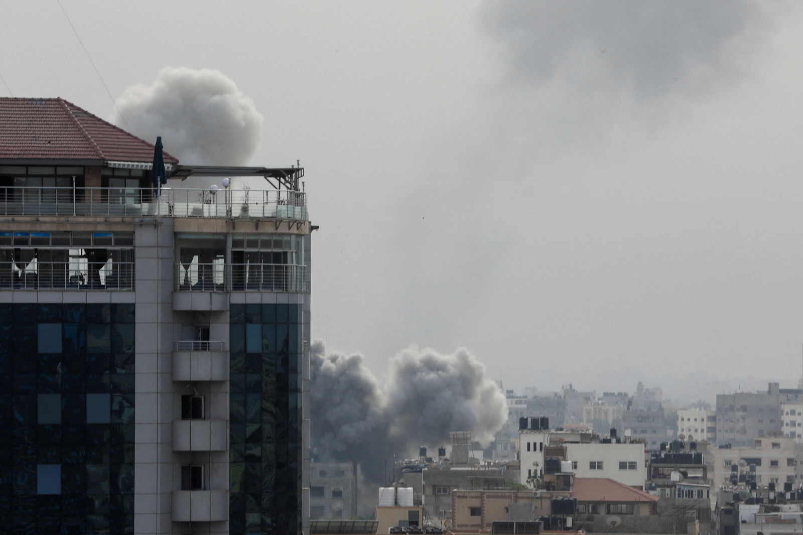 Plumes of smoke rise during Israeli strikes, amid the ongoing conflict between Israel and Palestinian Islamist group Hamas, in Gaza City, October 29, 2023.
