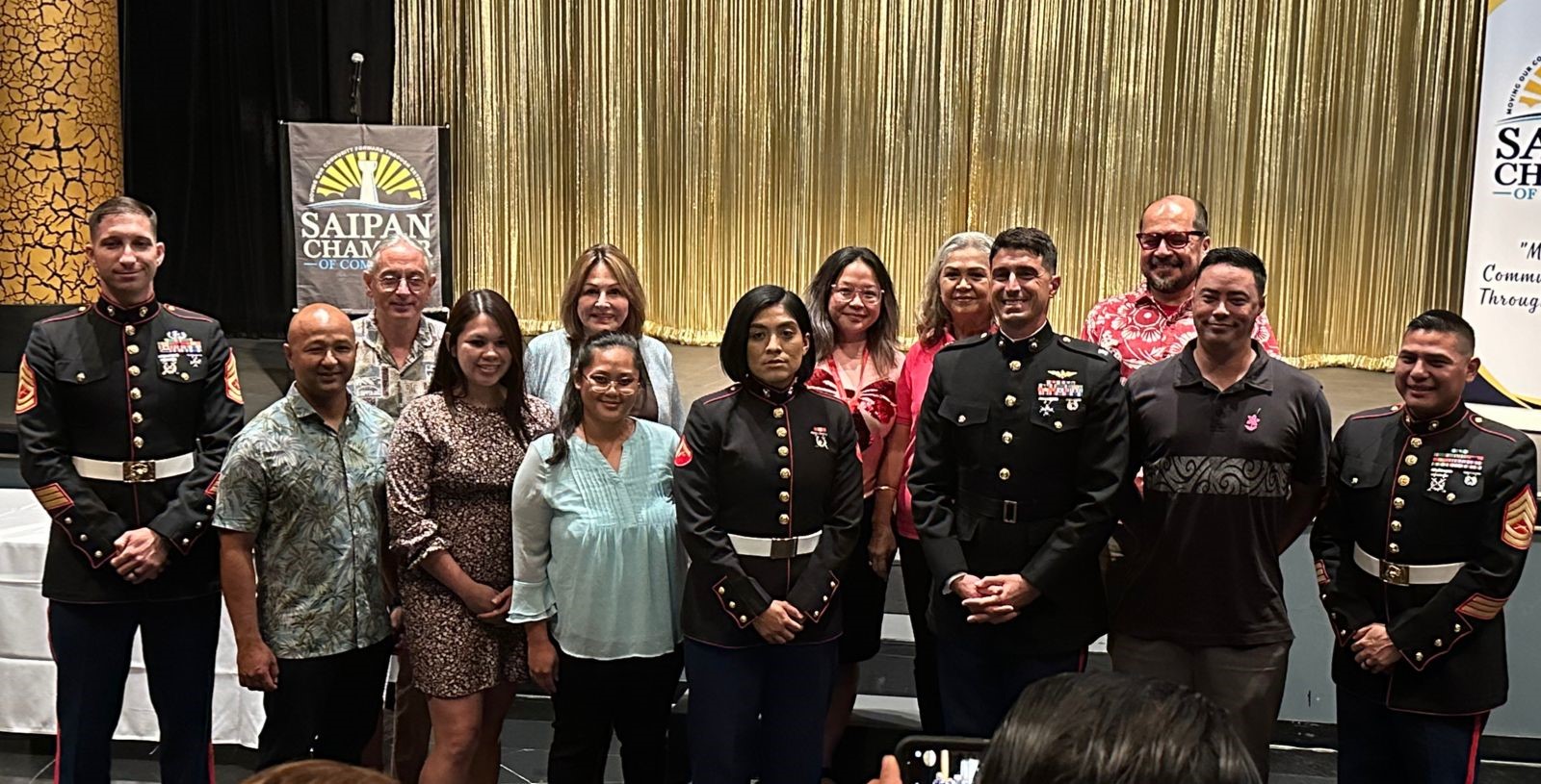Marine Corps Base Camp Blaz officers pose for a photo with Saipan Chamber of Commerce officers during the chamber’s meeting on Wednesday at the Hyatt Regency Saipan.