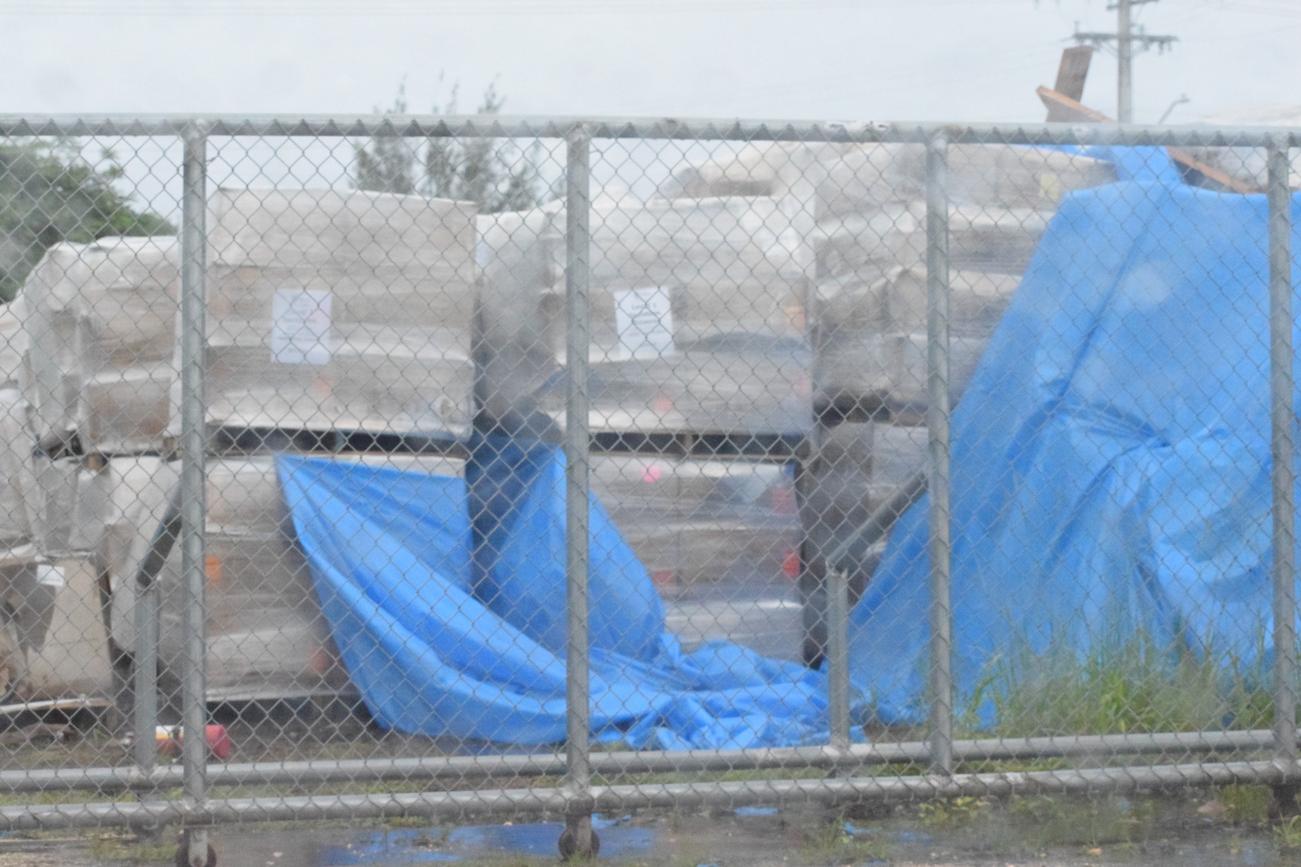 Boxes of personal protective equipment are piled near the Koblerville Fire Station.