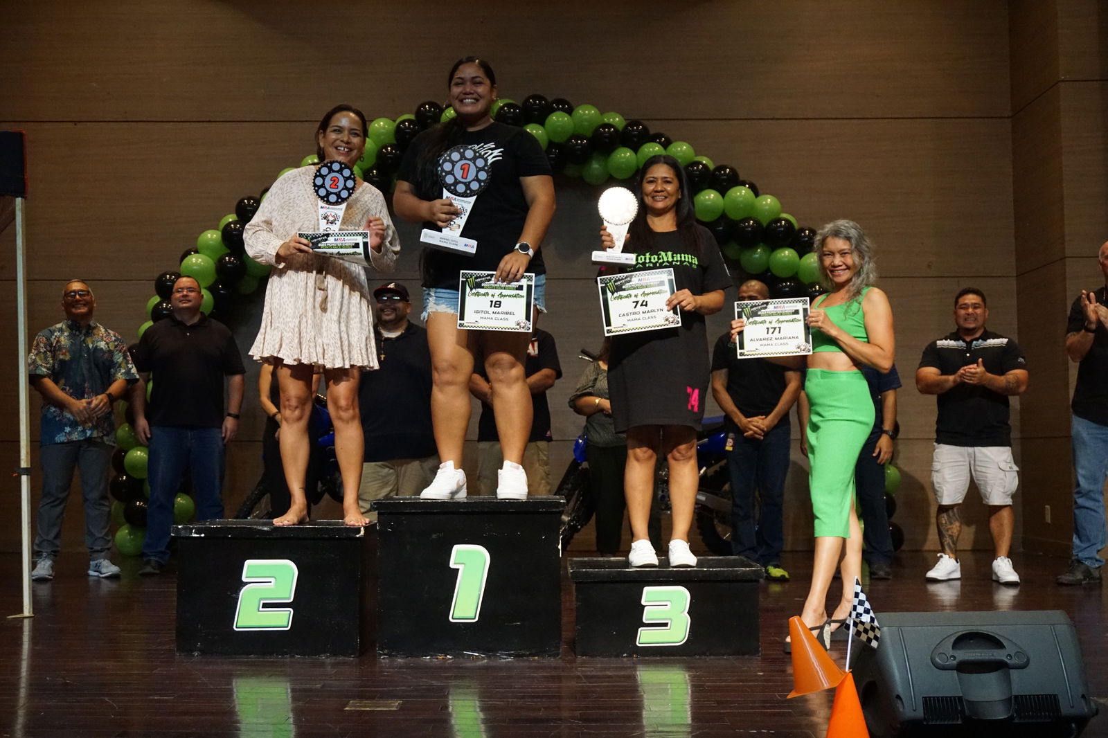 Maribel Igitol poses for a photo with the other Mamas Class participants of the 2023 Marianas Racing Association Monster Energy Points Race Series during the awards ceremony Saturday at the Saipan World Resort Taga Hall.