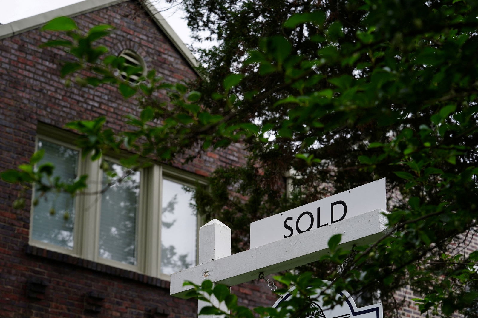 A "sold" sign is seen outside of a recently purchased home in Washington, U.S., July 7, 2022. 