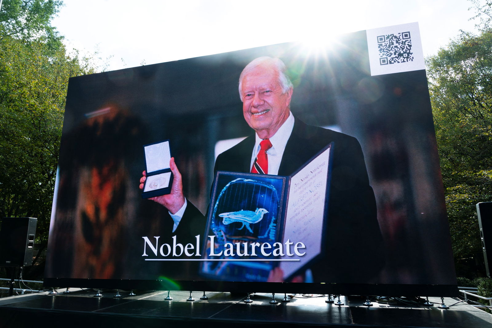 Former U.S. President Jimmy Carter is seen on a screen at a public birthday party held a day before Mr. Carter turns 99 years old, at the Jimmy Carter Presidential Library and Museum in Atlanta, Georgia, U.S. September 30, 2023. 