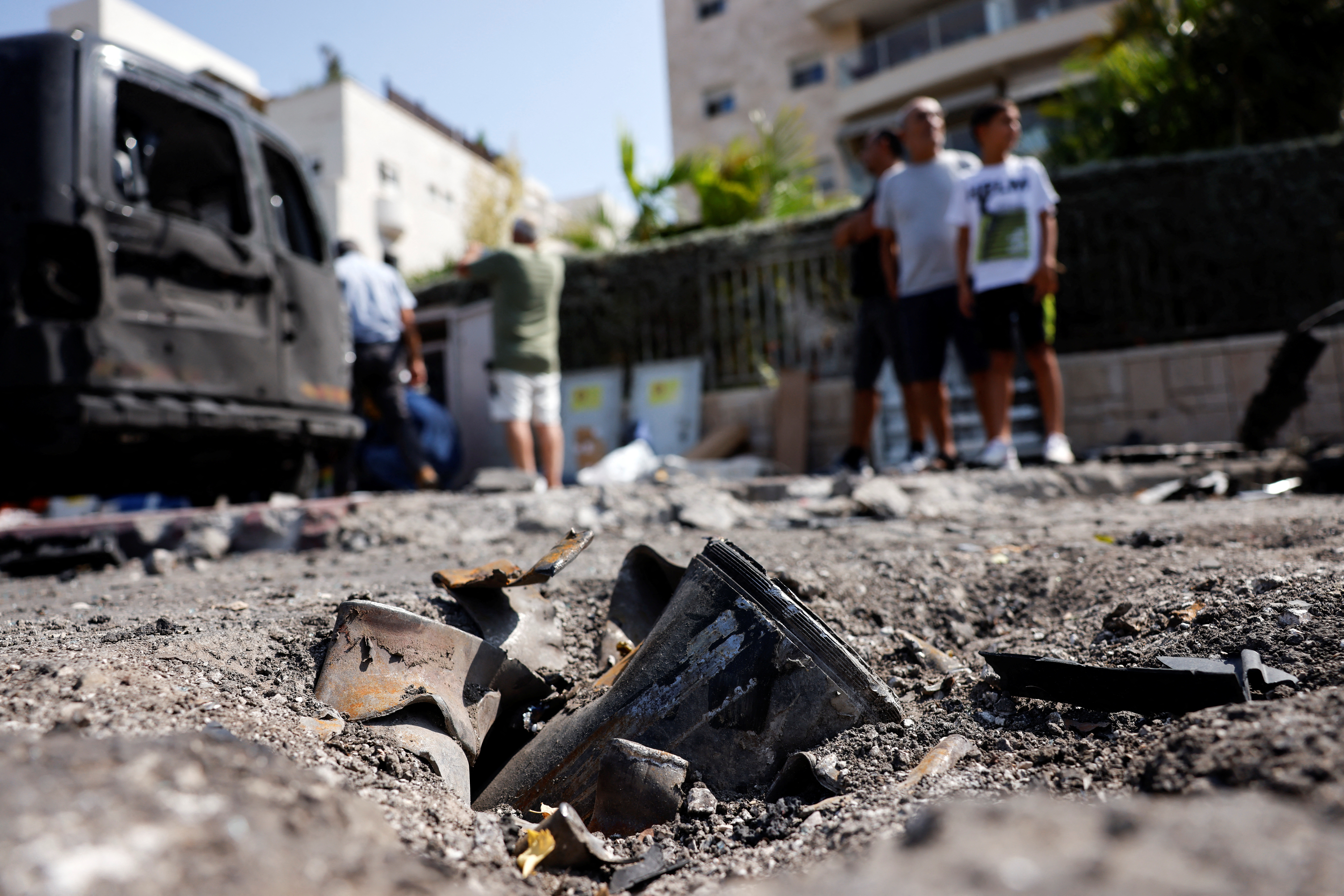 The remains of a rocket fired from the Gaza Strip into Israel lies on a road where it fell in Ashkelon, southern Israel, October 10, 2023. REUTERS/Amir Cohen